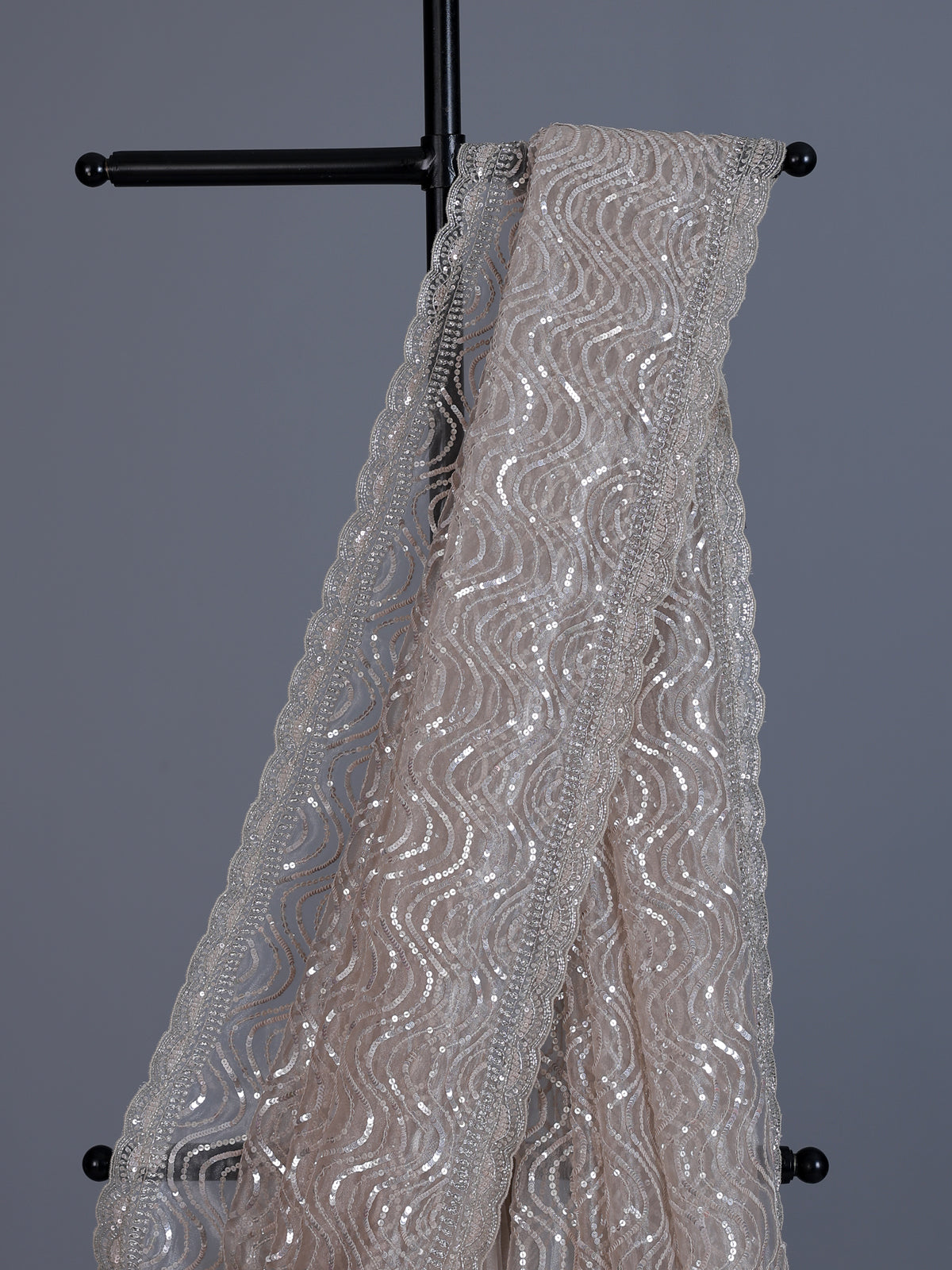 Beige tissue silk wedding wear saree with sequins and cutdana work