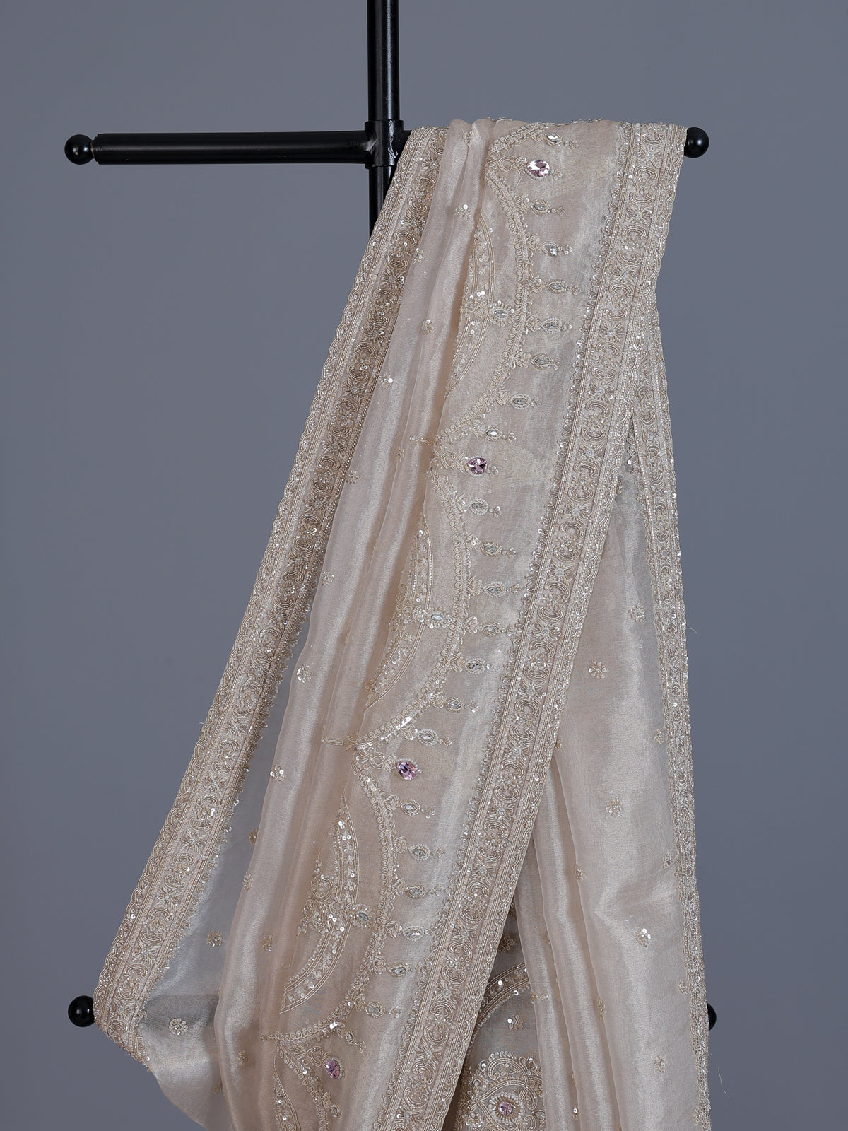 Beige tissue silk reception wear saree with cutdana work
