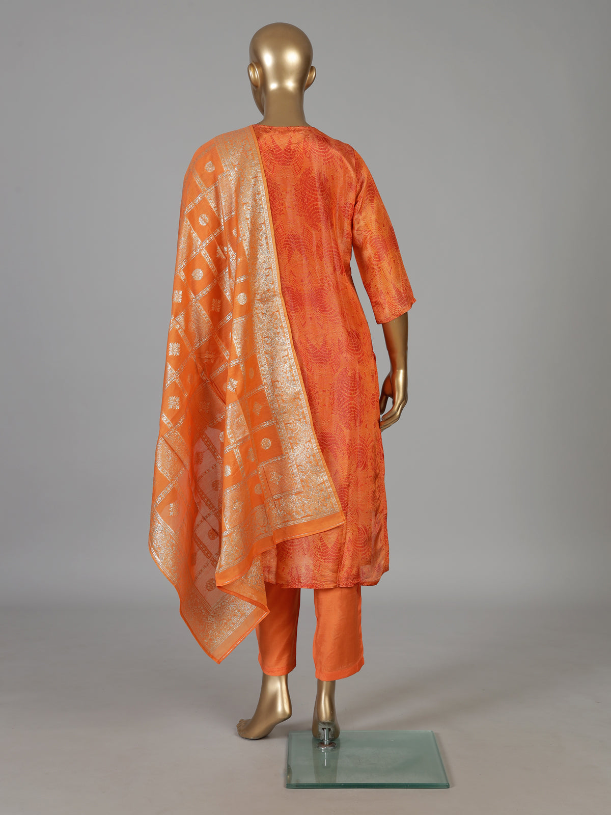 Orange silk festive kurti set with zari embellished neckline