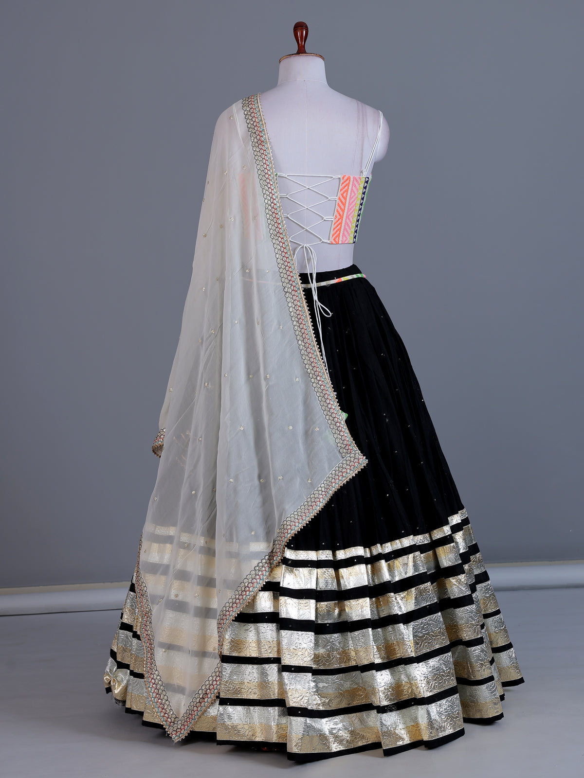Black tissue silk navratri wear lehenga choli with sleeveless choli