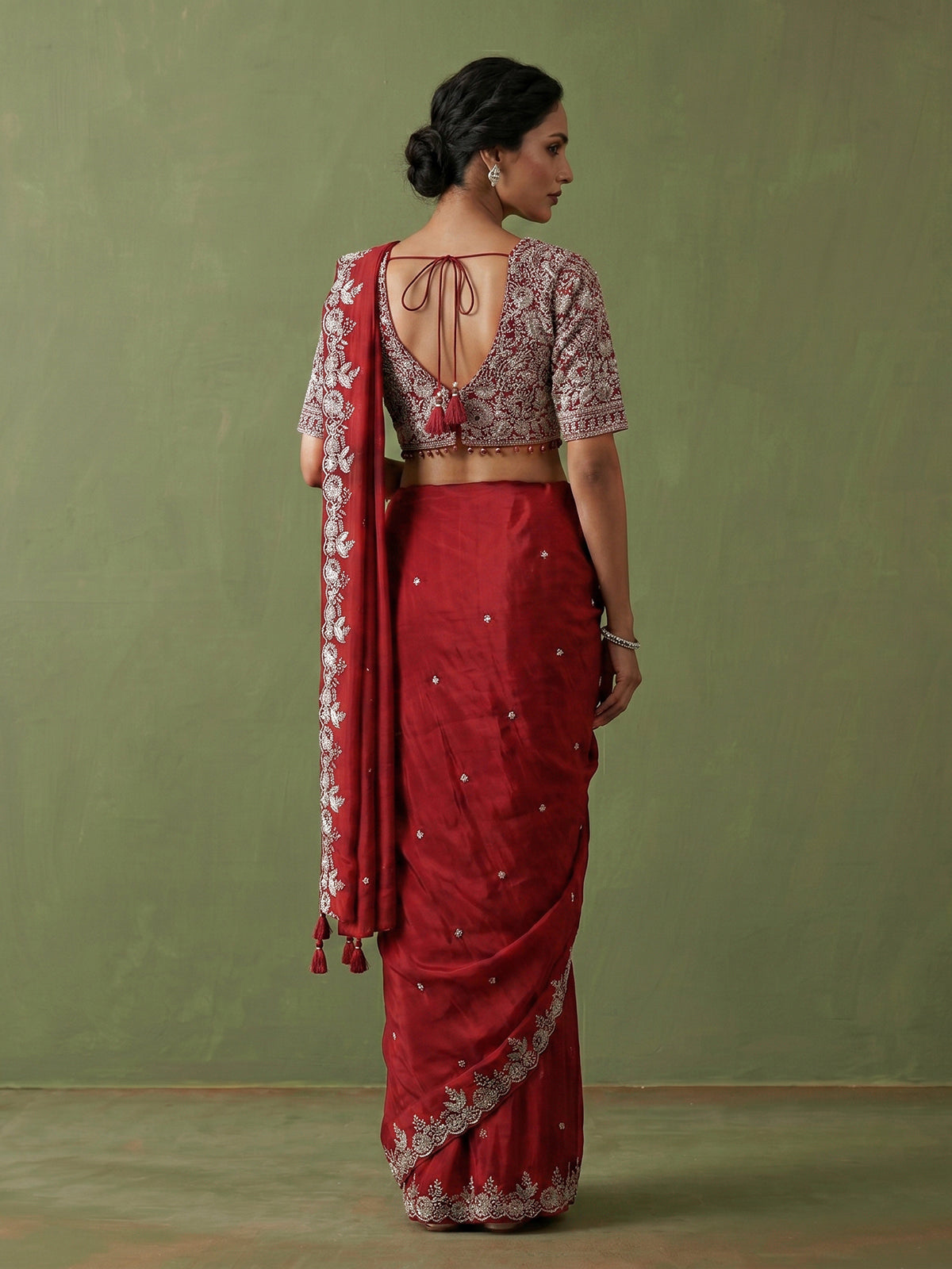 Maroon tissue silk designer saree with elegant embellishments