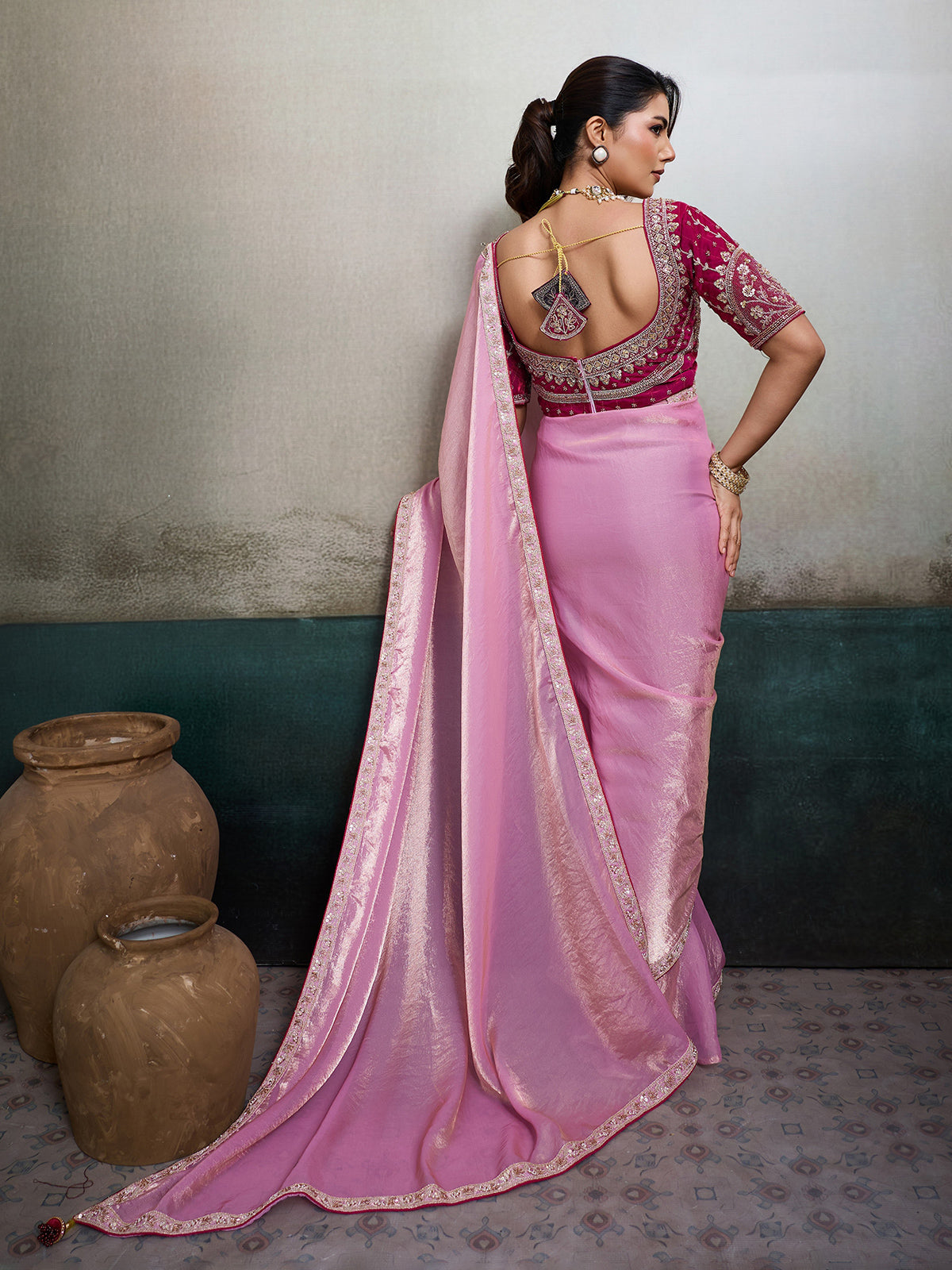 Pink satin saree with embellished magenta blouse