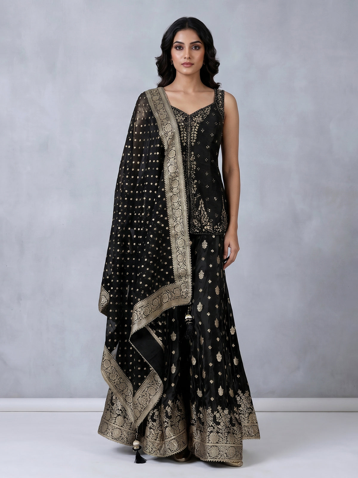 Black silk palazzo suit with elegant embellishments