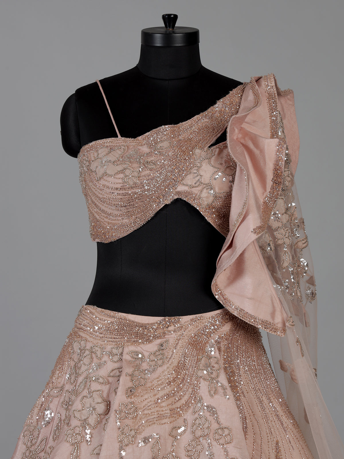 Peach raw silk and net lehenga choli design
