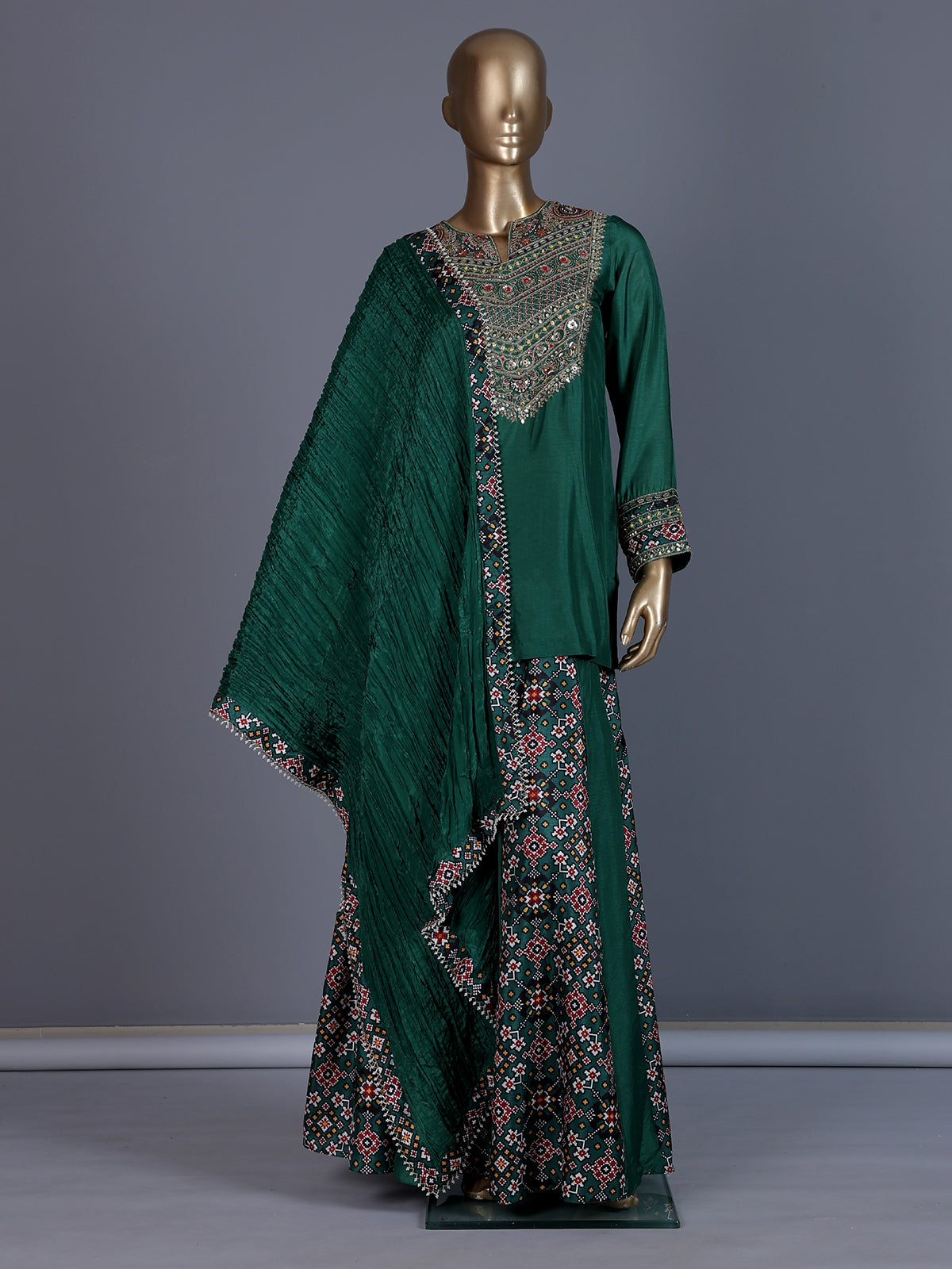 Dark green embroidered silk palazzo suit with printed dupatta