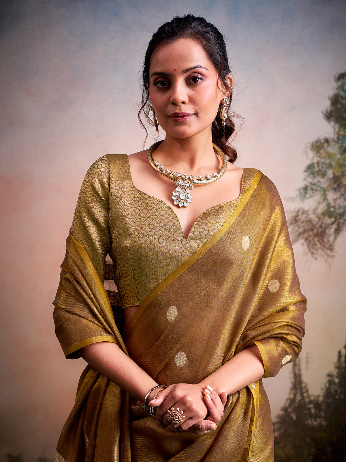 Sophisticated olive zari tissue silk festive saree