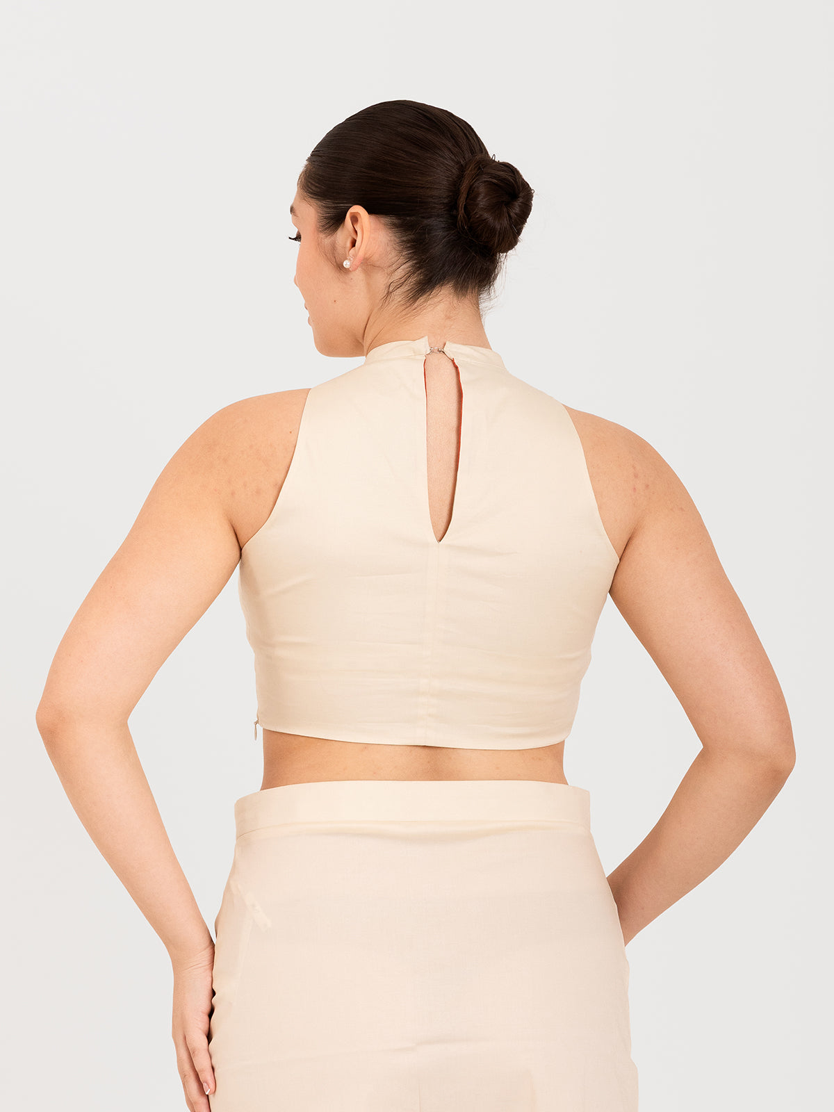 White cotton lycra high halter neck sleeveless blouse