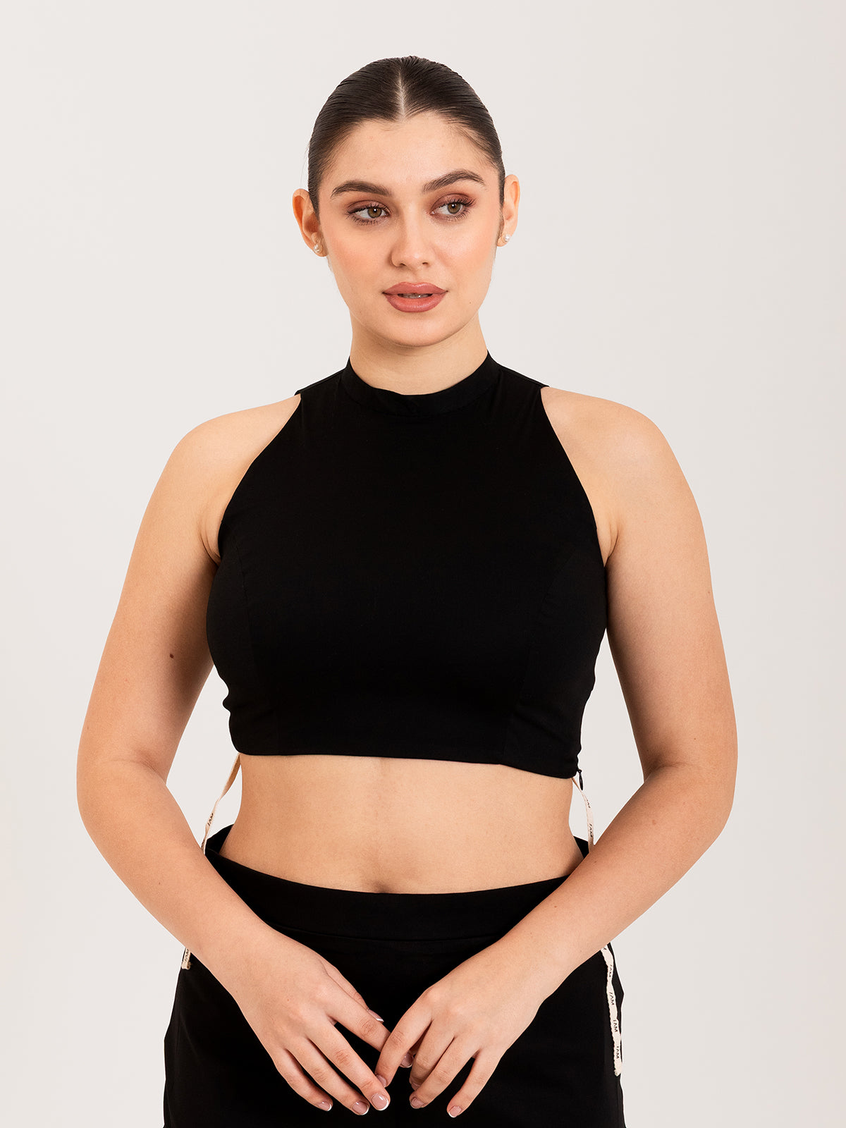 Black cotton lycra high halter neck sleeveless blouse