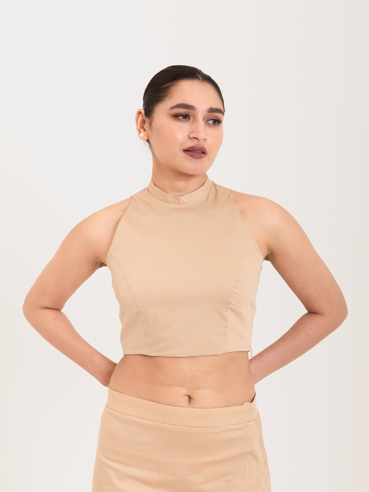 Beige cotton lycra high halter neck sleeveless blouse