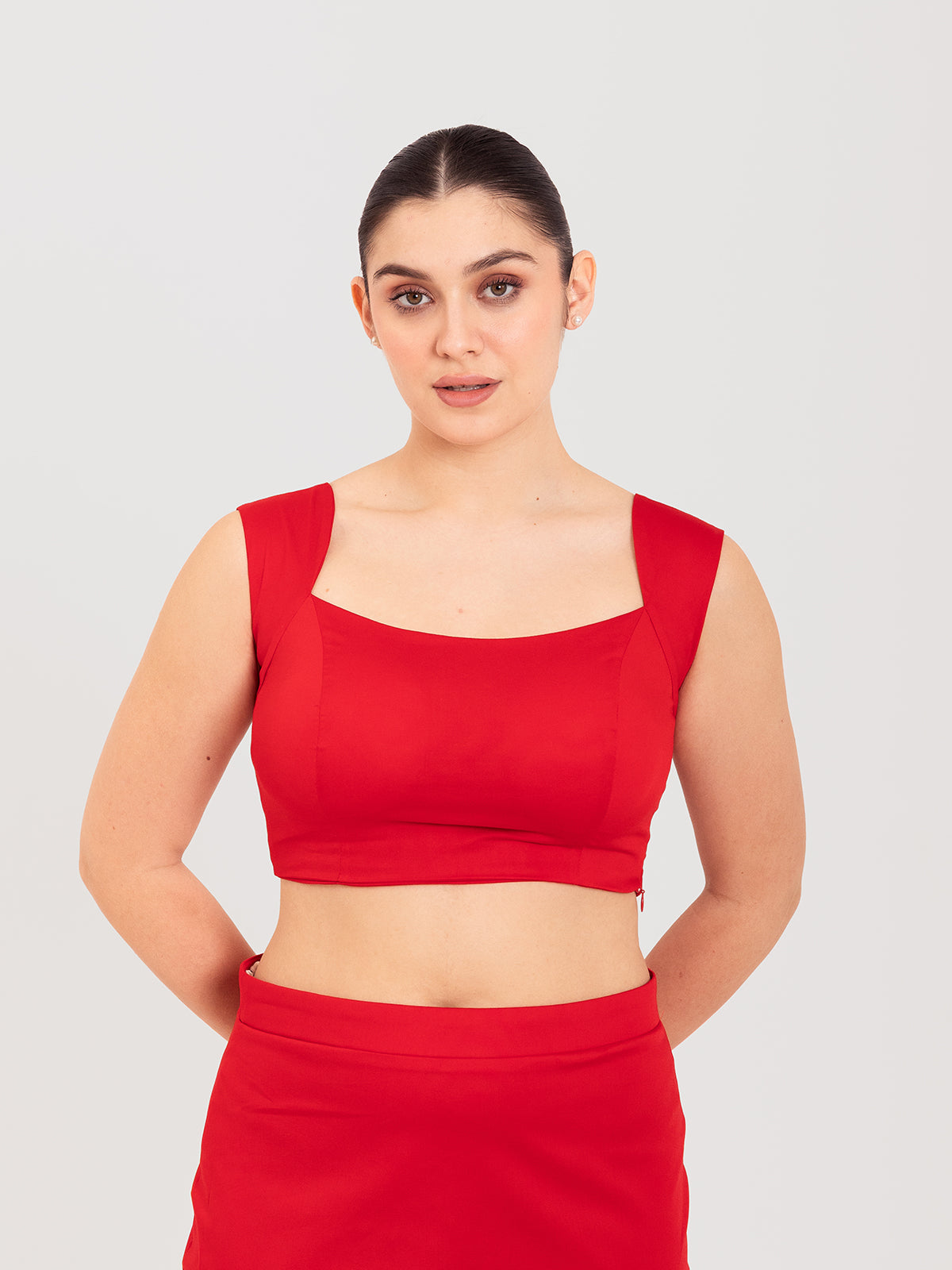 Red cotton lycra curved sweetheart neck sleeveless blouse