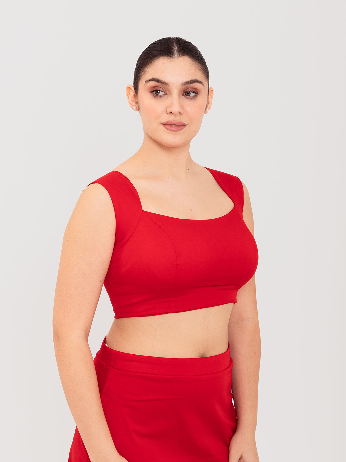 Red cotton lycra curved sweetheart neck sleeveless blouse