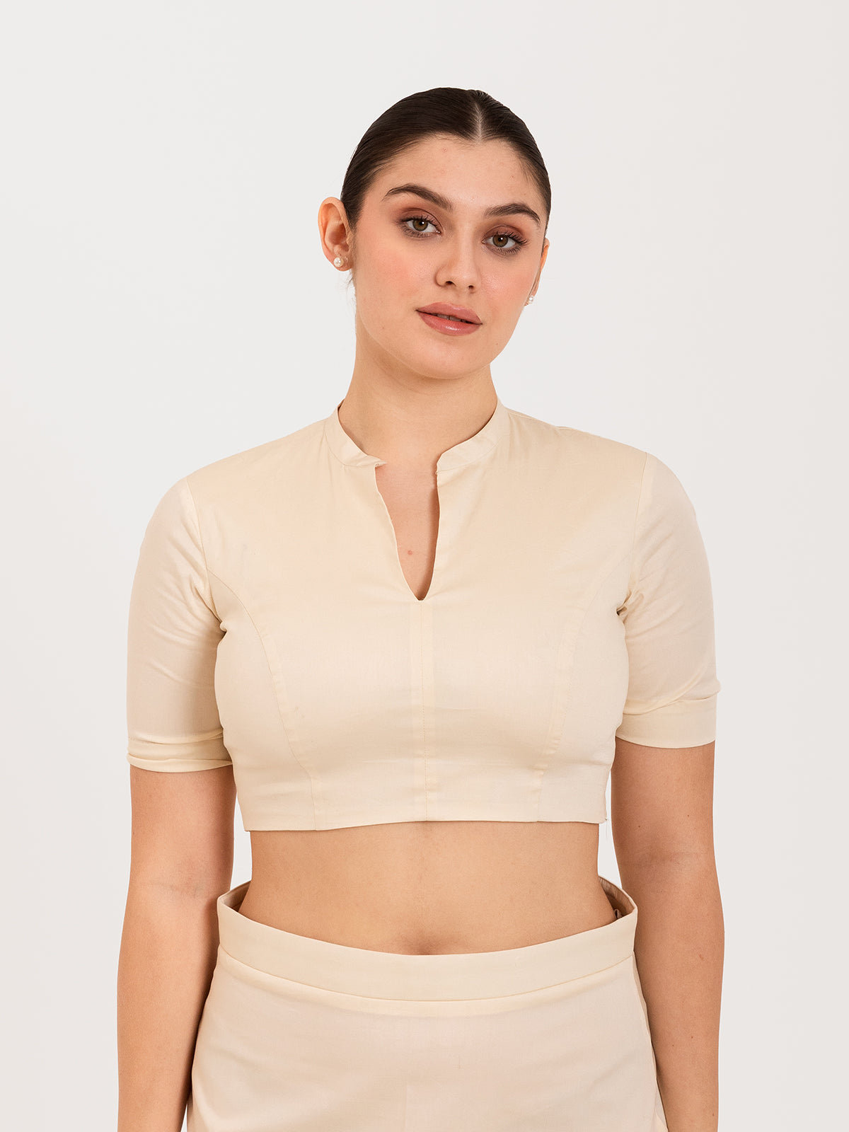White cotton lycra collar neck sleeveless blouse