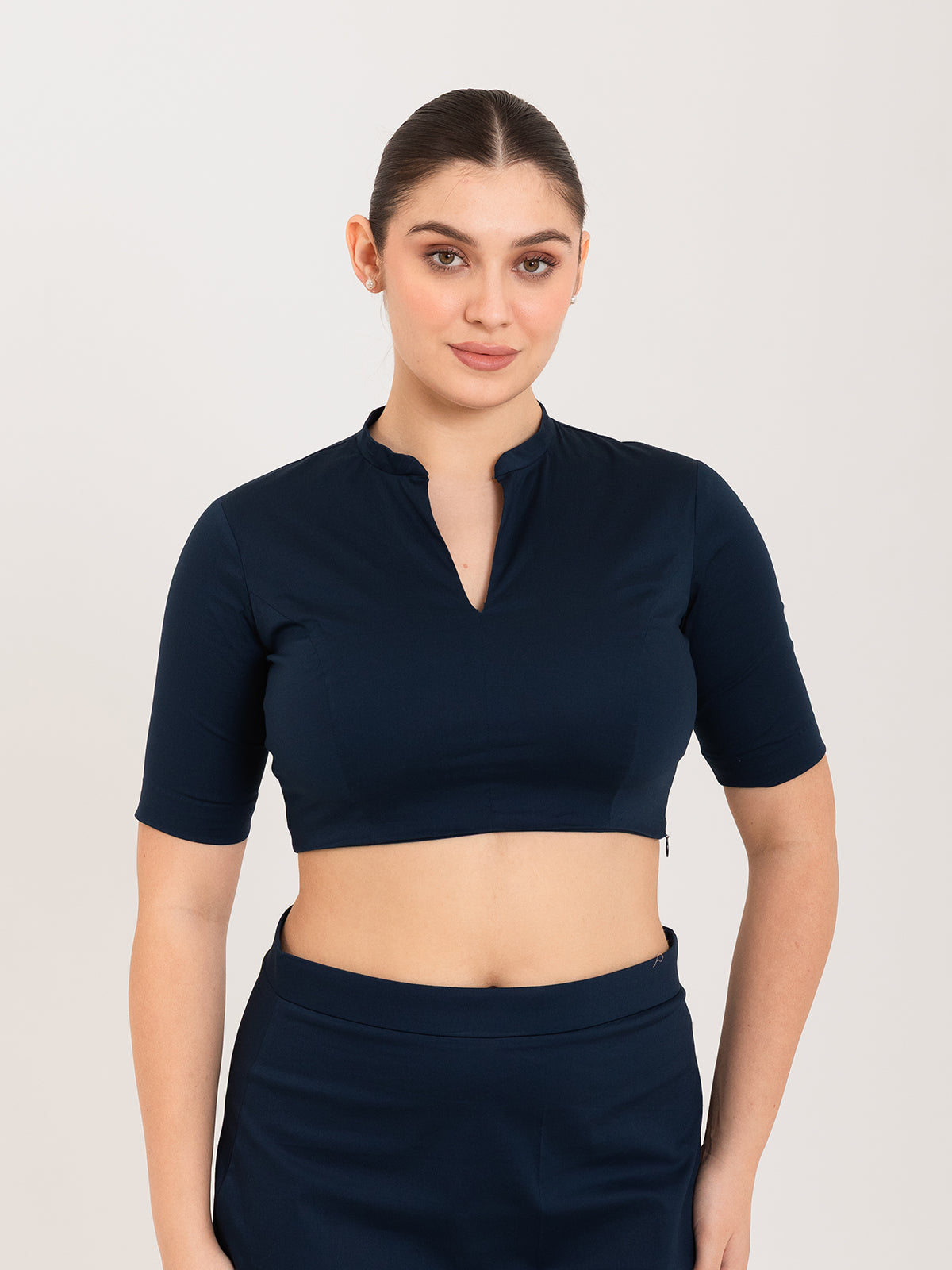 Blue cotton lycra collar neck sleeveless blouse