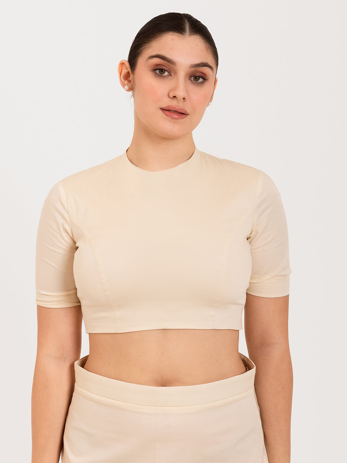 White cotton lycra round neck sleeveless blouse