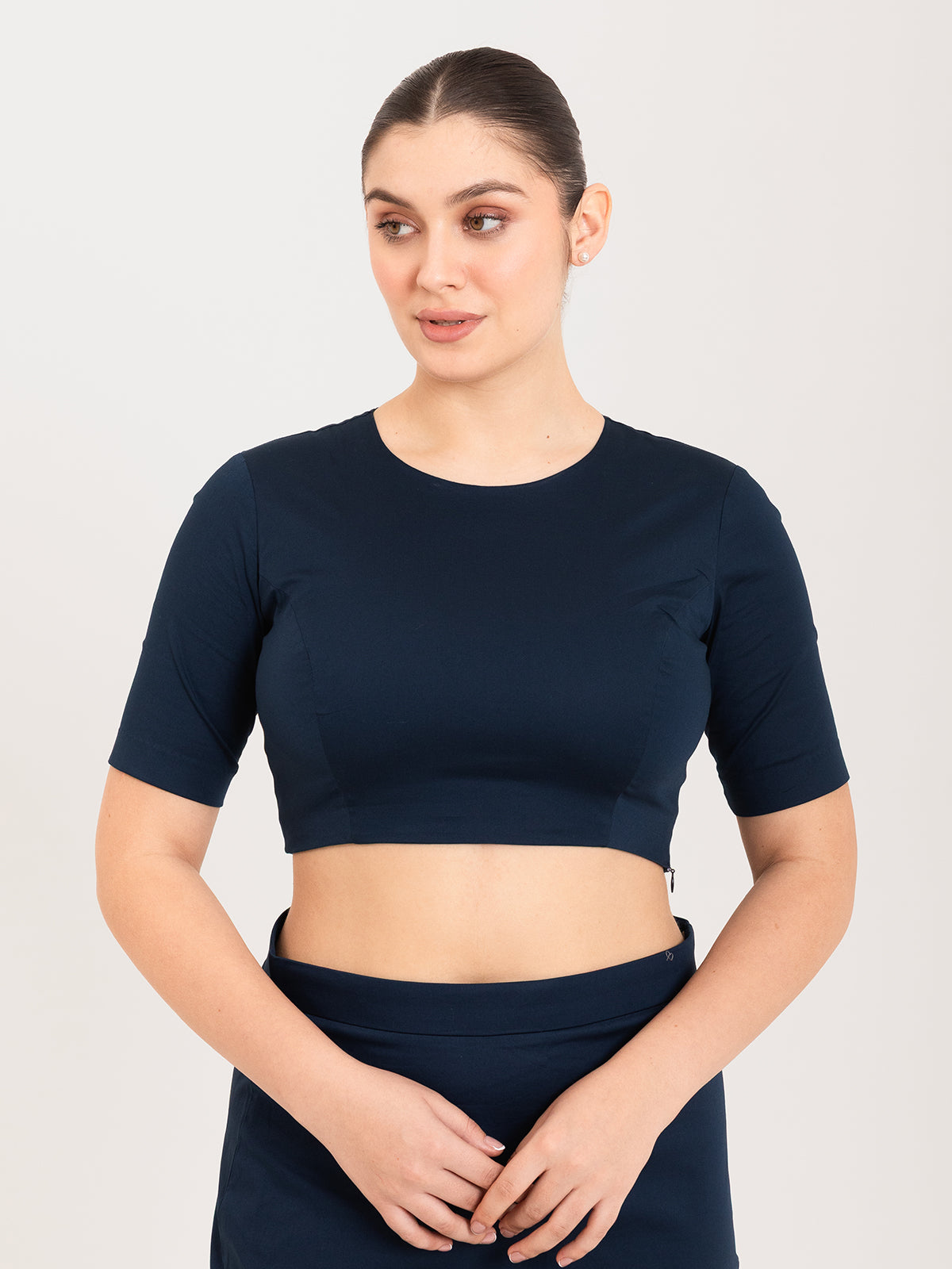 Blue cotton lycra round neck sleeveless blouse