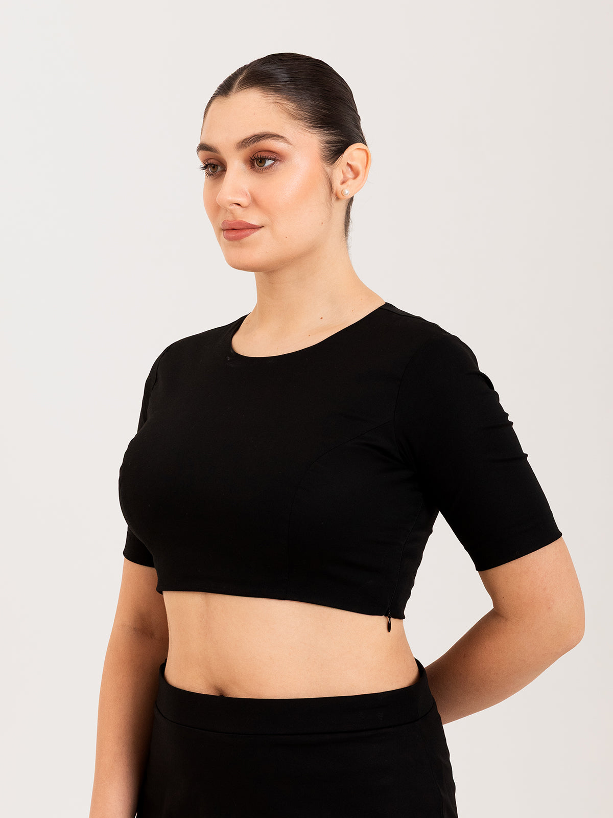 Black cotton lycra round neck sleeveless blouse