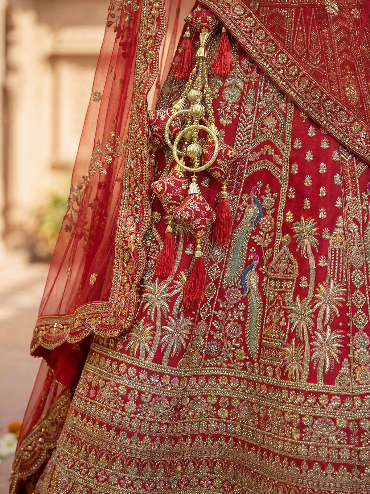 Red peacock embroidered bridal silk lehenga choli ensemble
