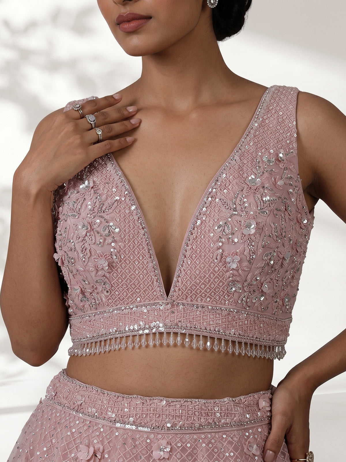 Pink designer net embellished lehenga choli