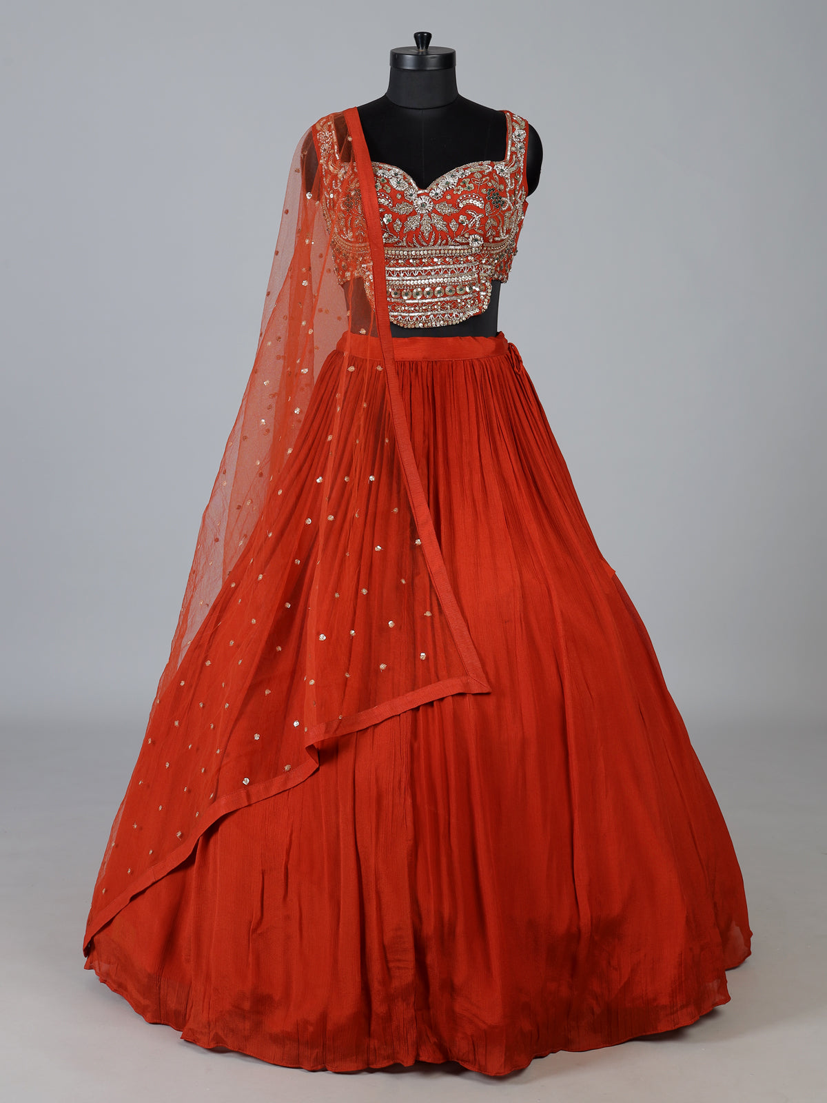 Rust orange embroidered georgette silk lehenga choli