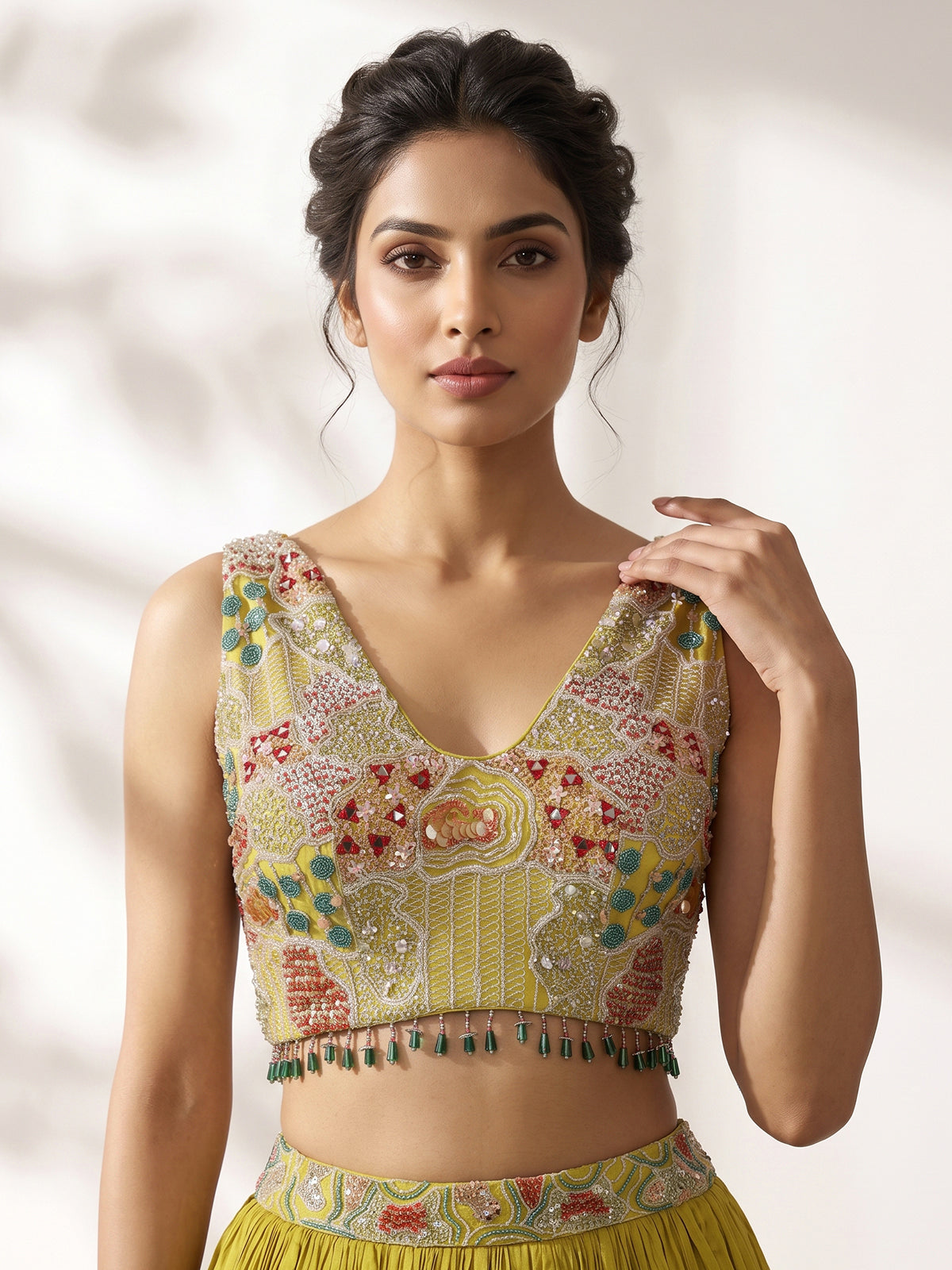 Yellow chinon silk haldi lehenga choli with choker