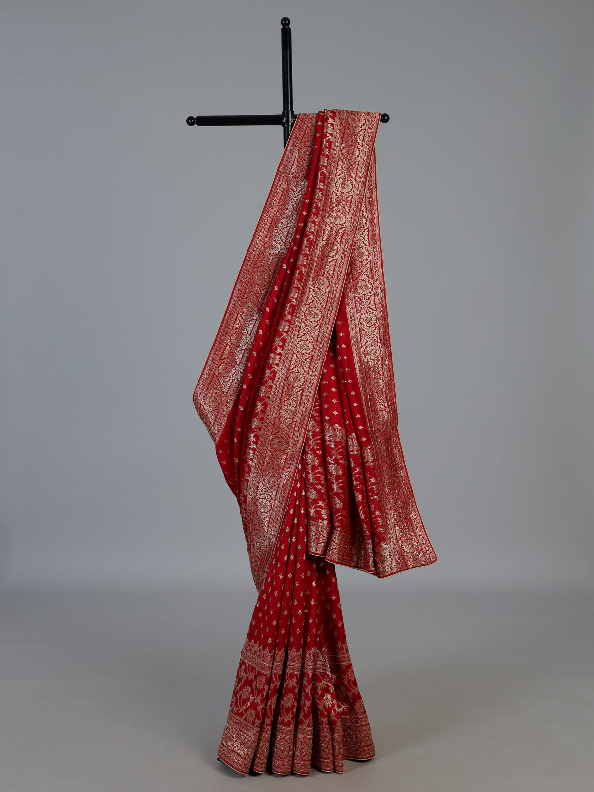 Maroon royal dola silk saree with ornate zari woven border