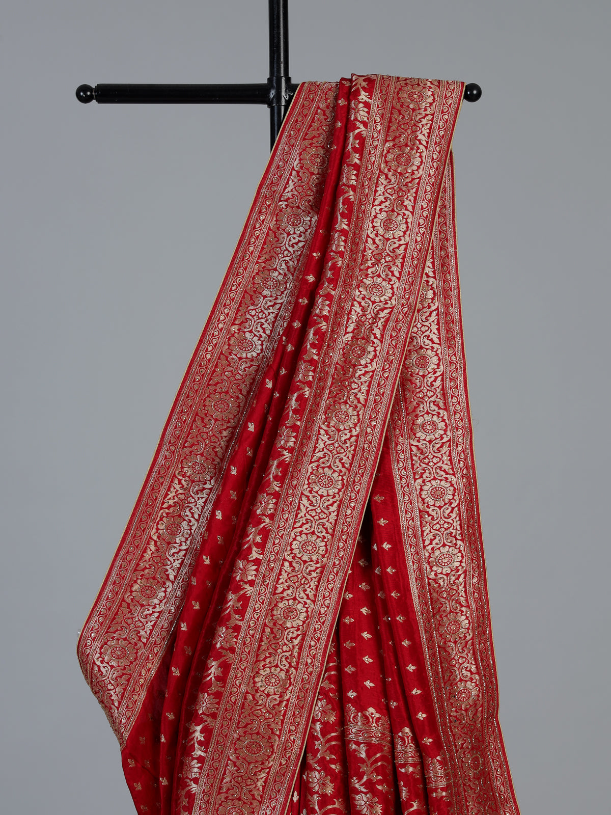 Maroon royal dola silk saree with ornate zari woven border