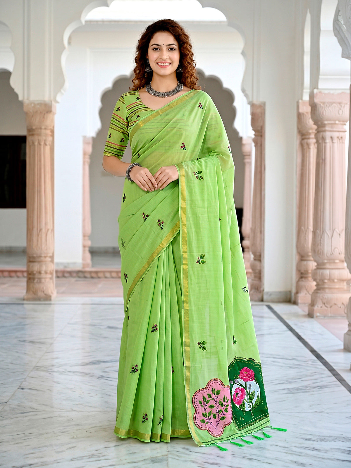 Green floral printed cotton blend saree with elegant patch work