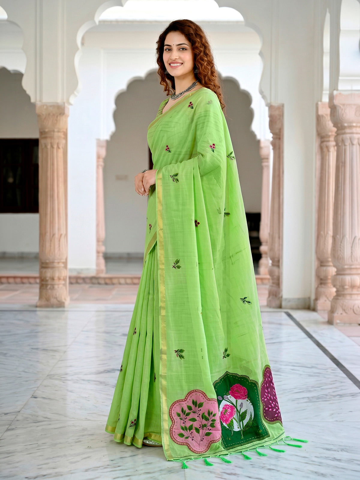 Green floral printed cotton blend saree with elegant patch work