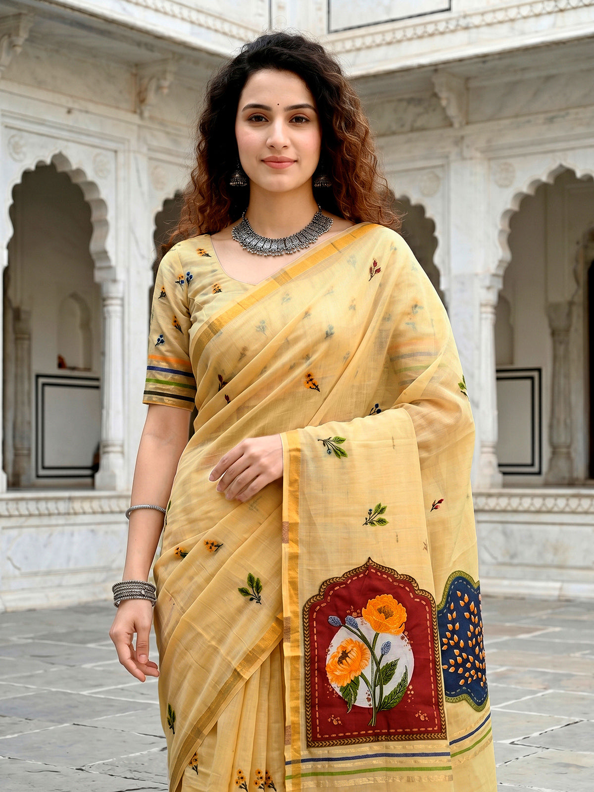 Yellow festive cotton blend saree with artistic patch work