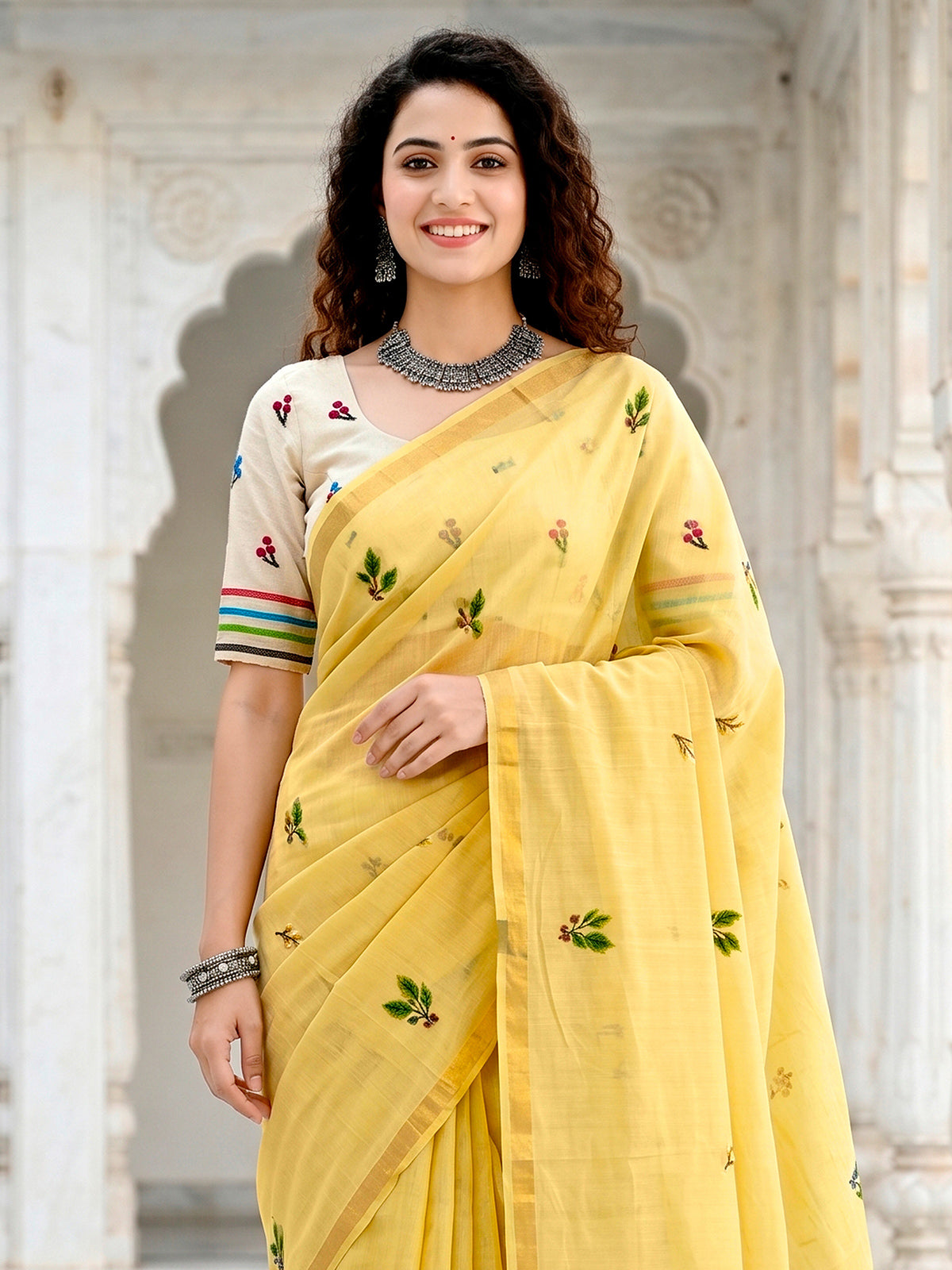 Light yellow elegant cotton blend saree with floral patch work