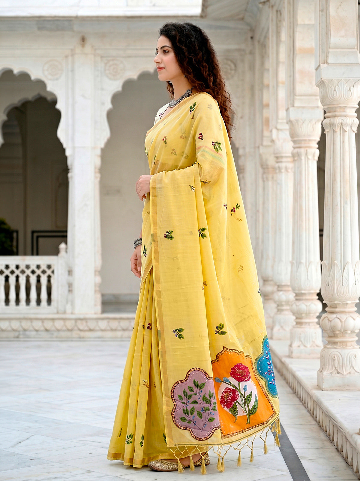 Light yellow elegant cotton blend saree with floral patch work