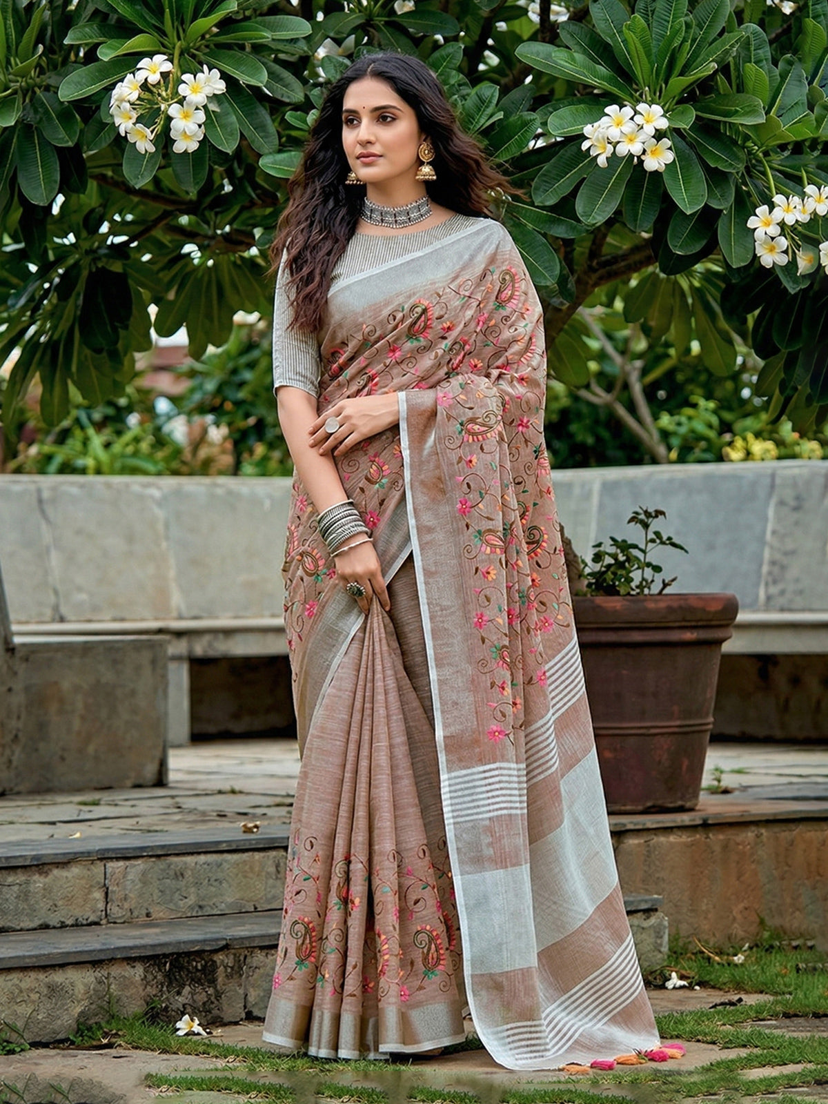 Brown floral kashmiri embroidered linen saree with elegant tassels