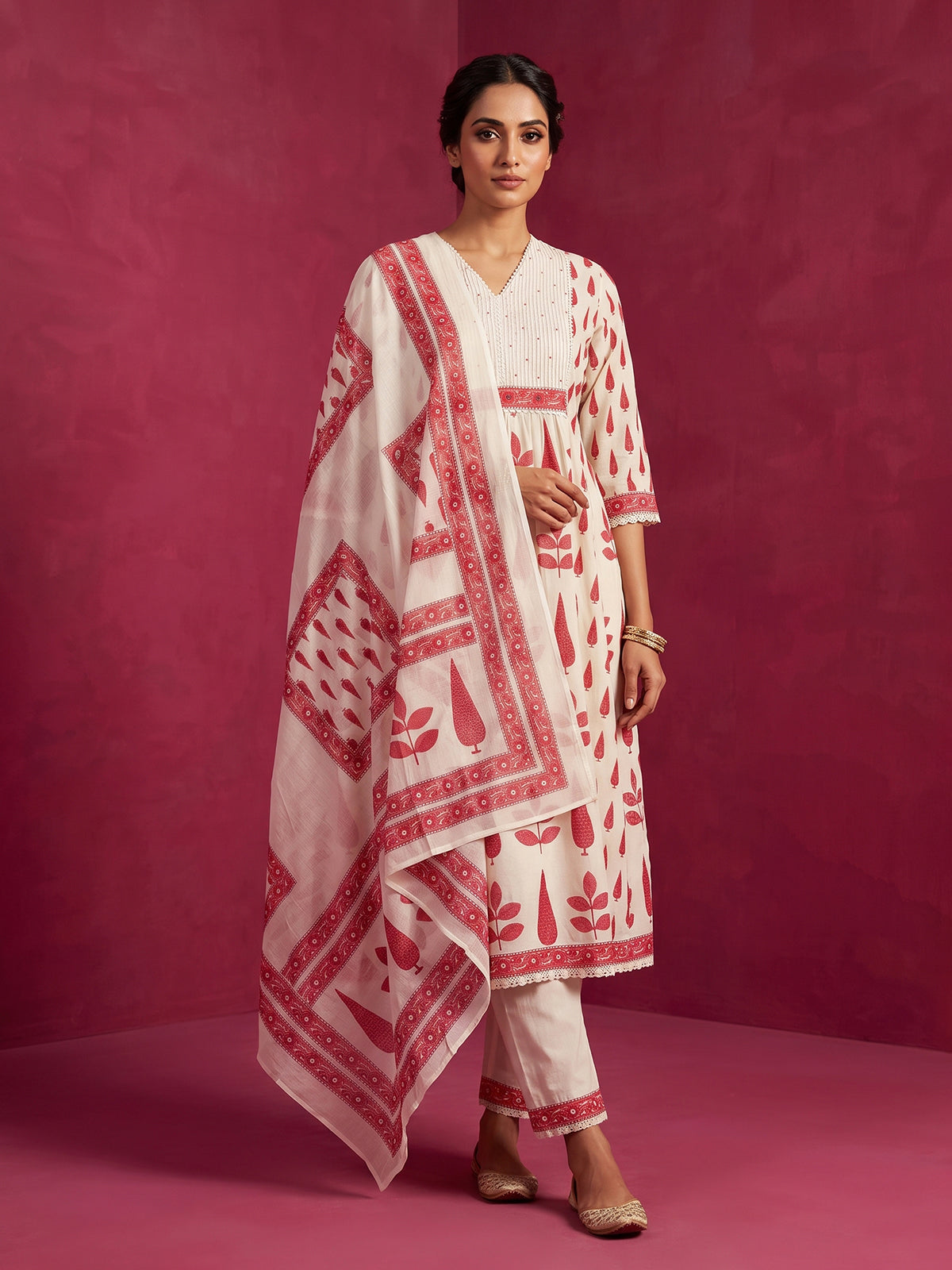 Off white floral kurti set with elegant festive styling