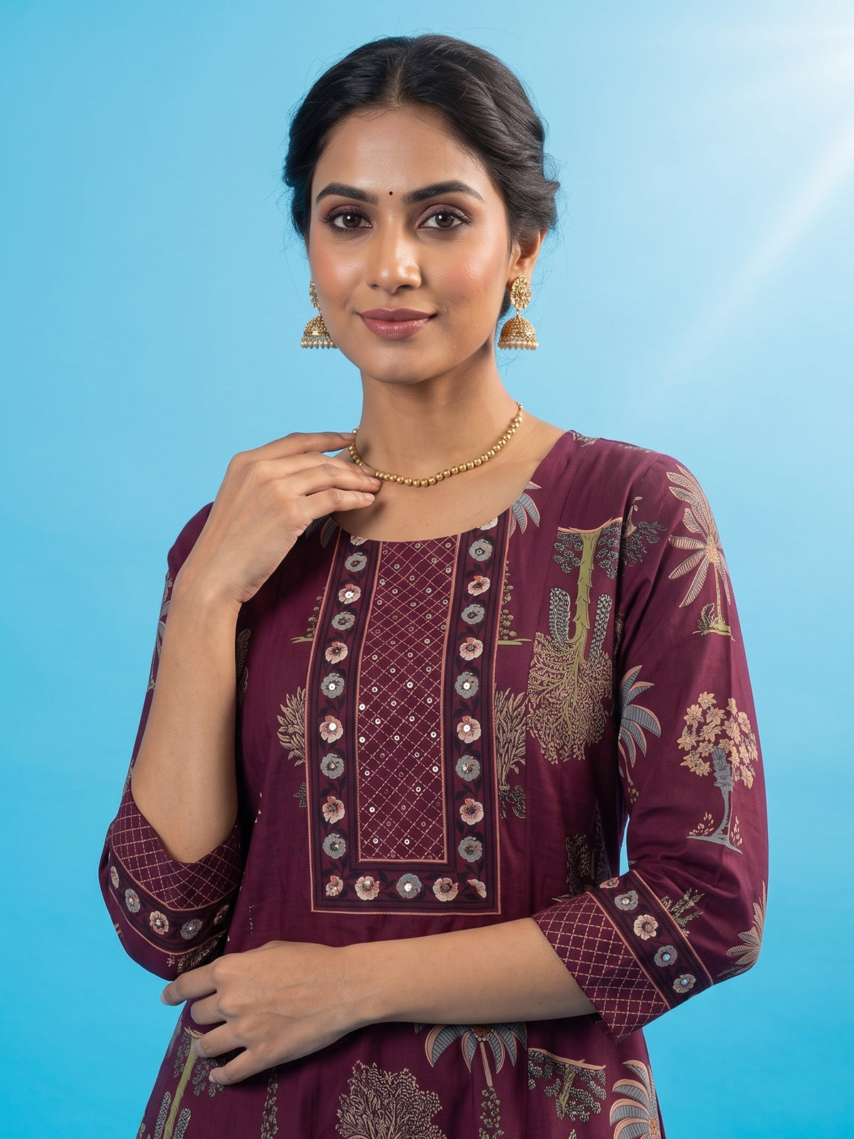 Purple floral kurti set with traditional printed elegance