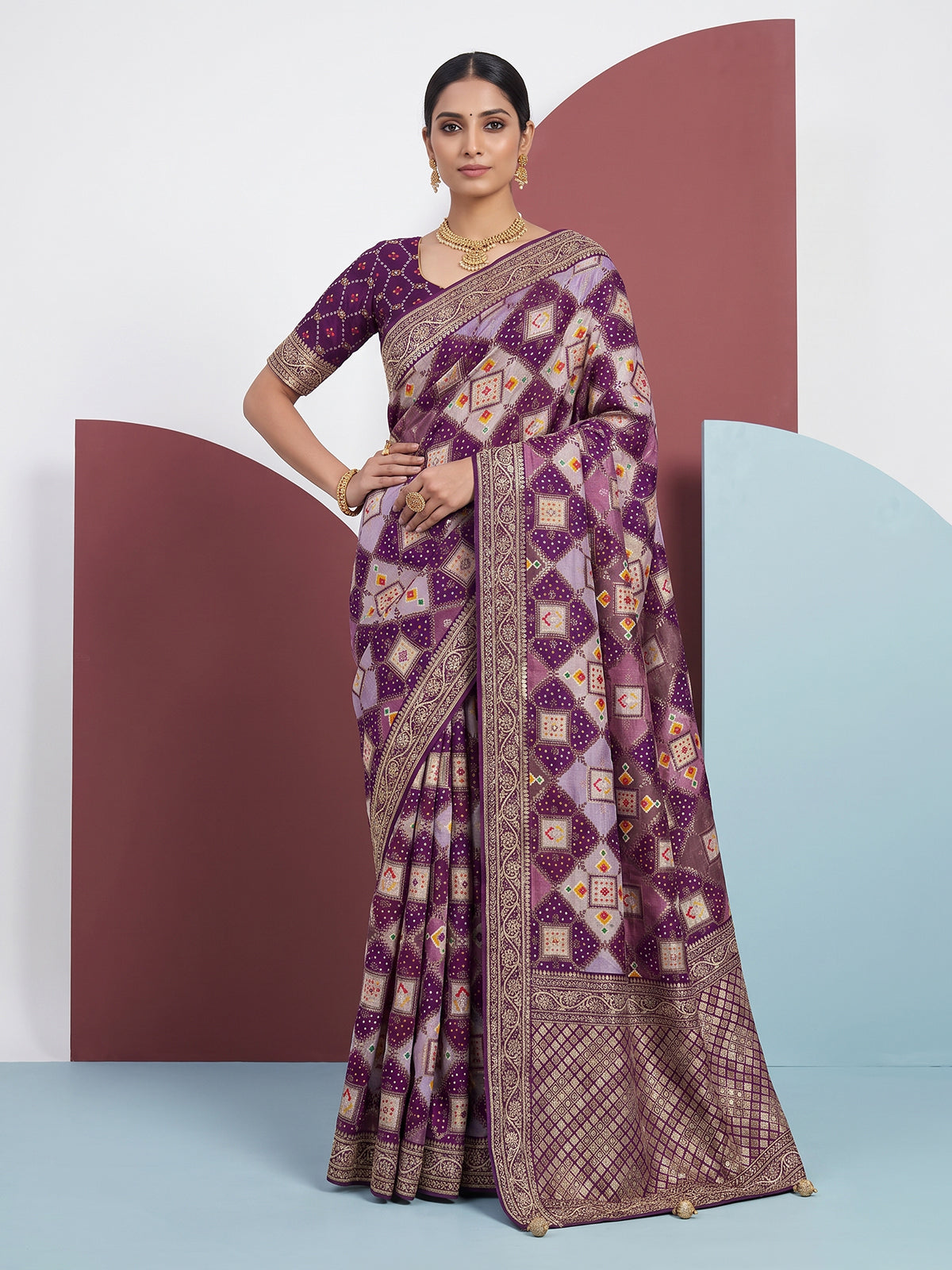 Purple bandhej printed dola silk saree with royal festive charm