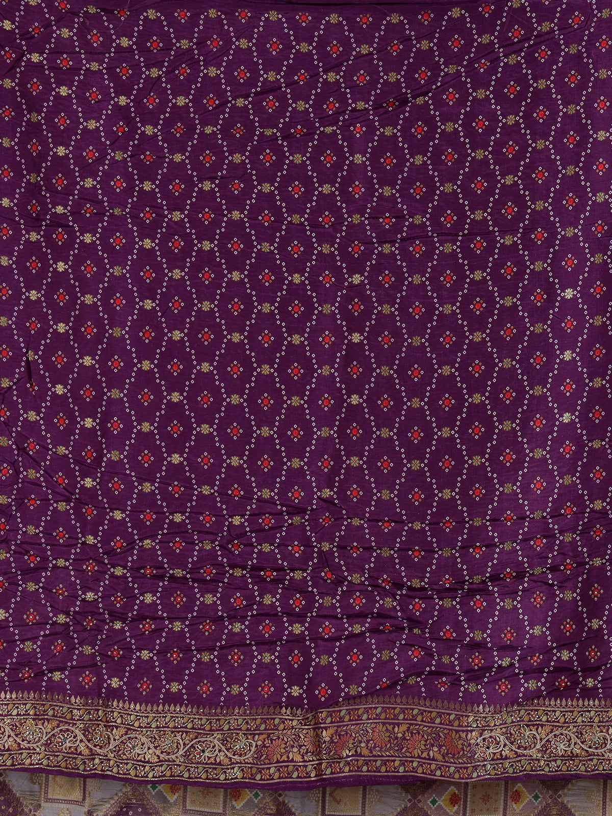 Purple bandhej printed dola silk saree with royal festive charm