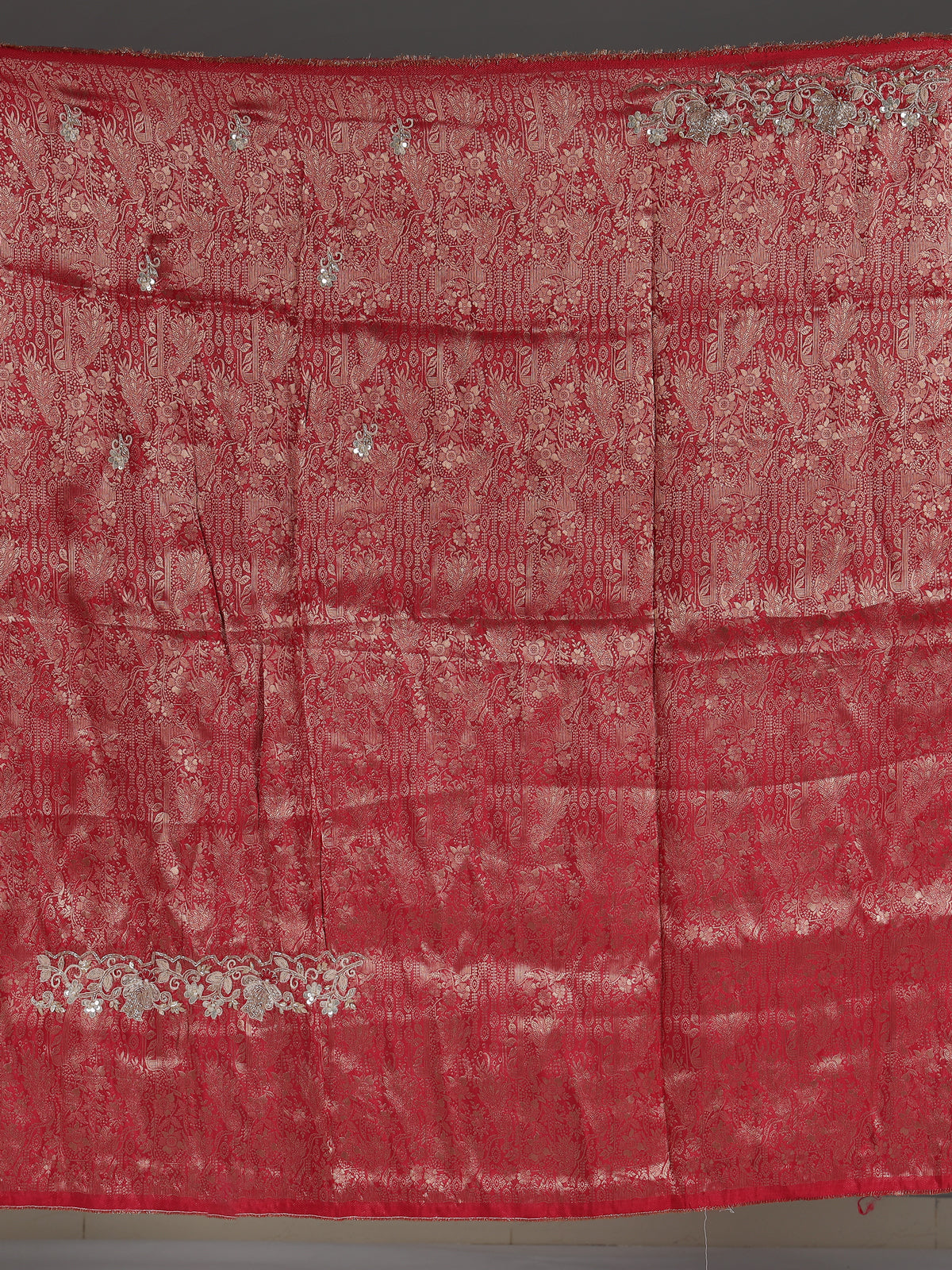Red tissue silk designer saree with luxurious festive