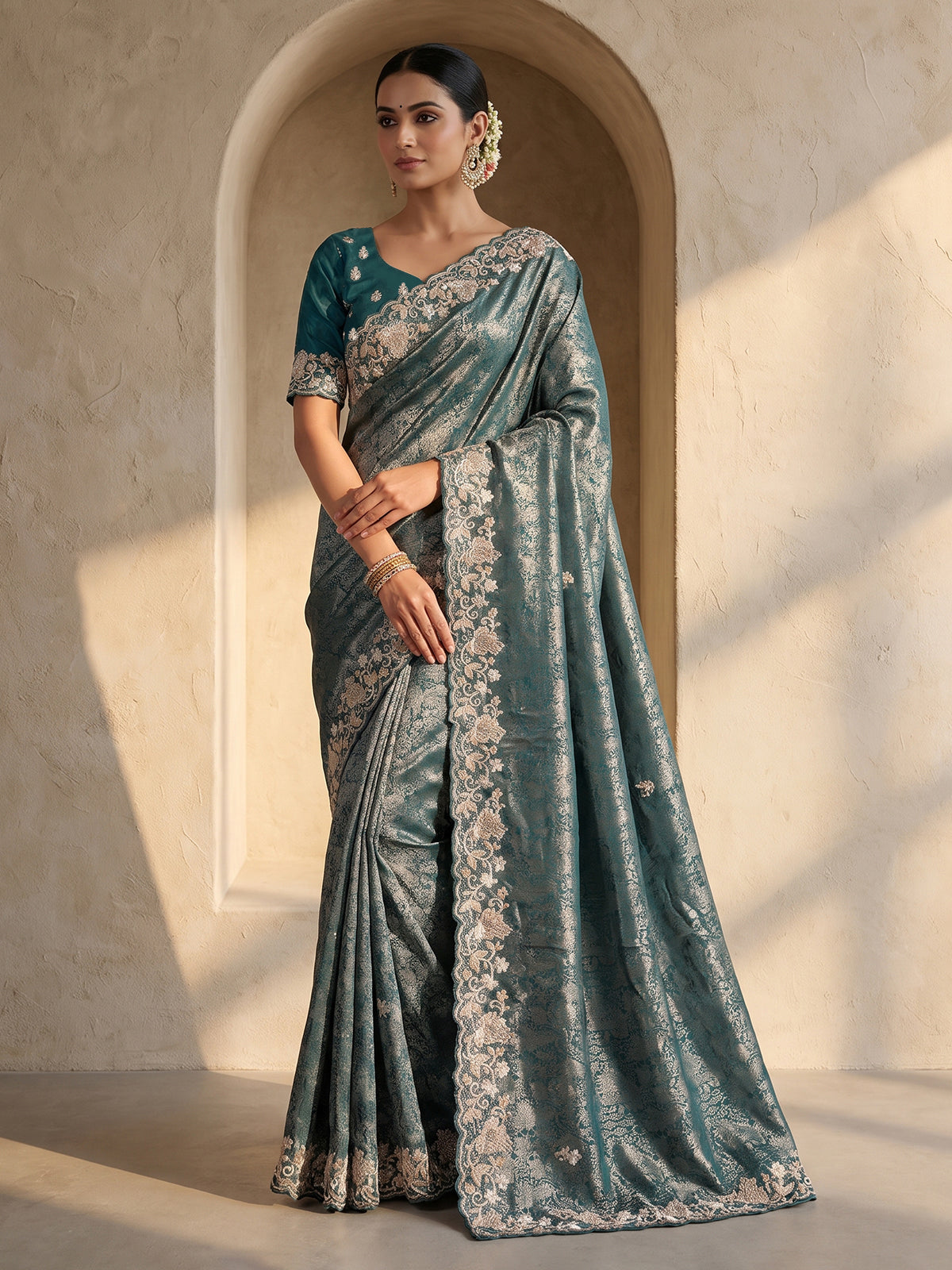 Rama green tissue silk saree with elegant festive craftsmanship