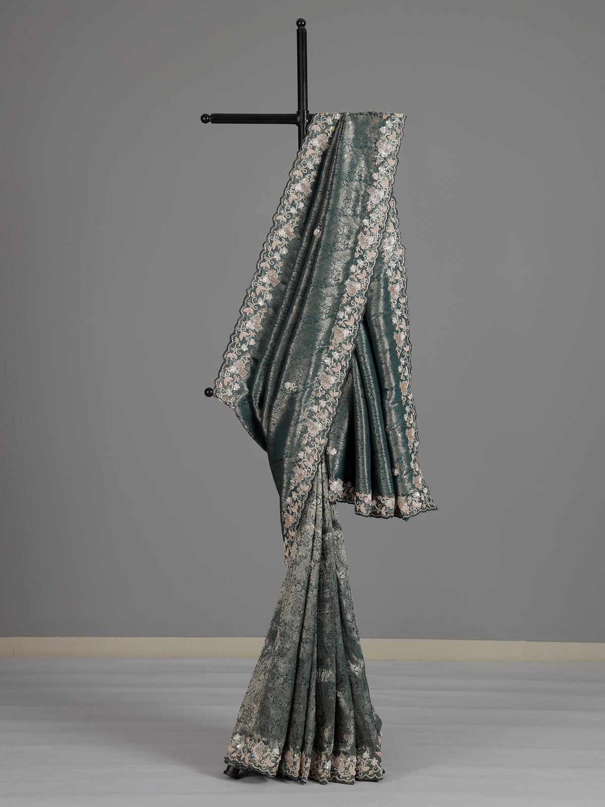 Rama green tissue silk saree with elegant festive craftsmanship