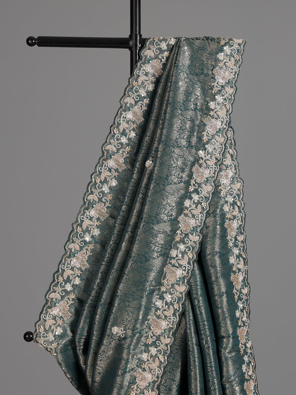 Rama green tissue silk saree with elegant festive craftsmanship