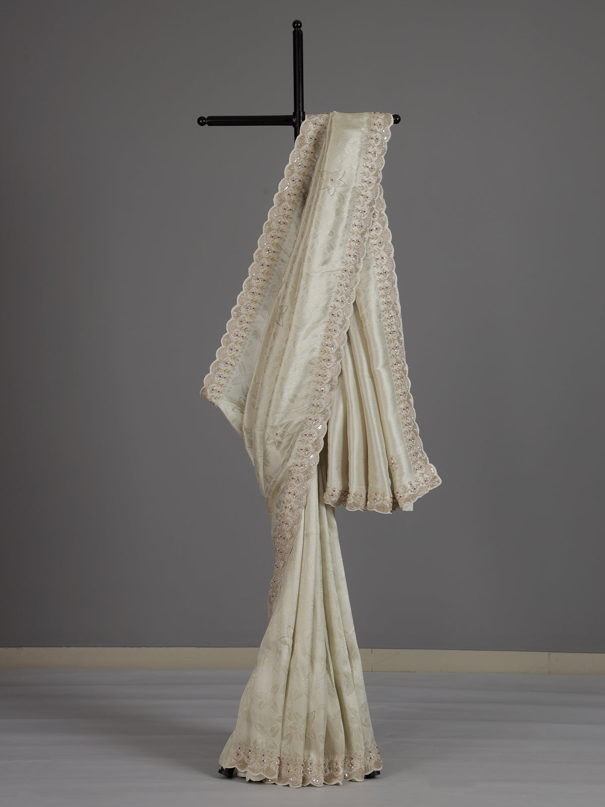 Off white ziraf silk festive saree with premium handcrafted details