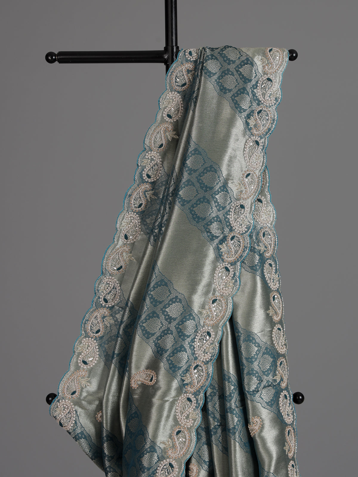 Teal blue tissue silk designer saree with elegant festive work