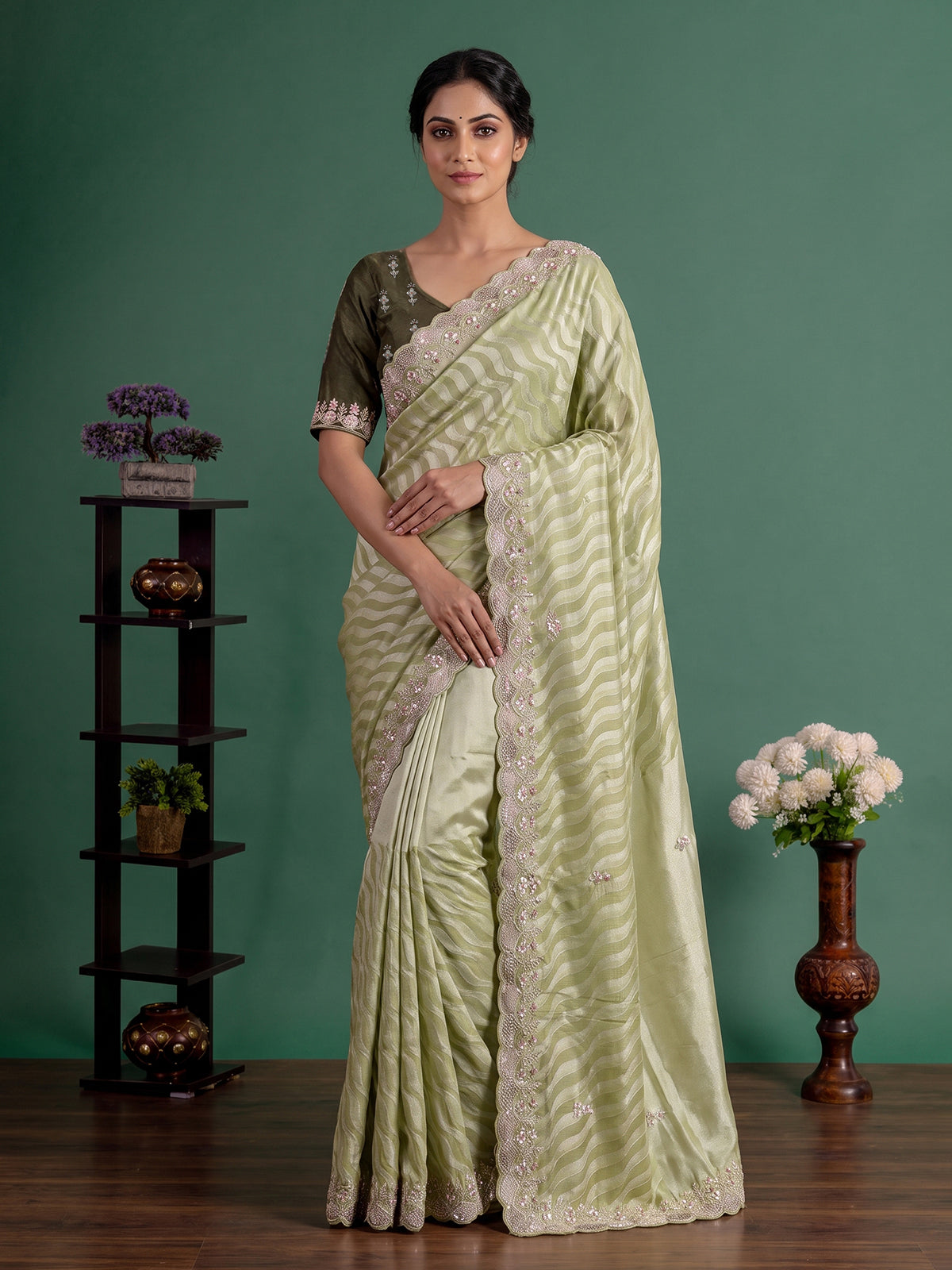 Pista green tissue dola silk saree with graceful festive