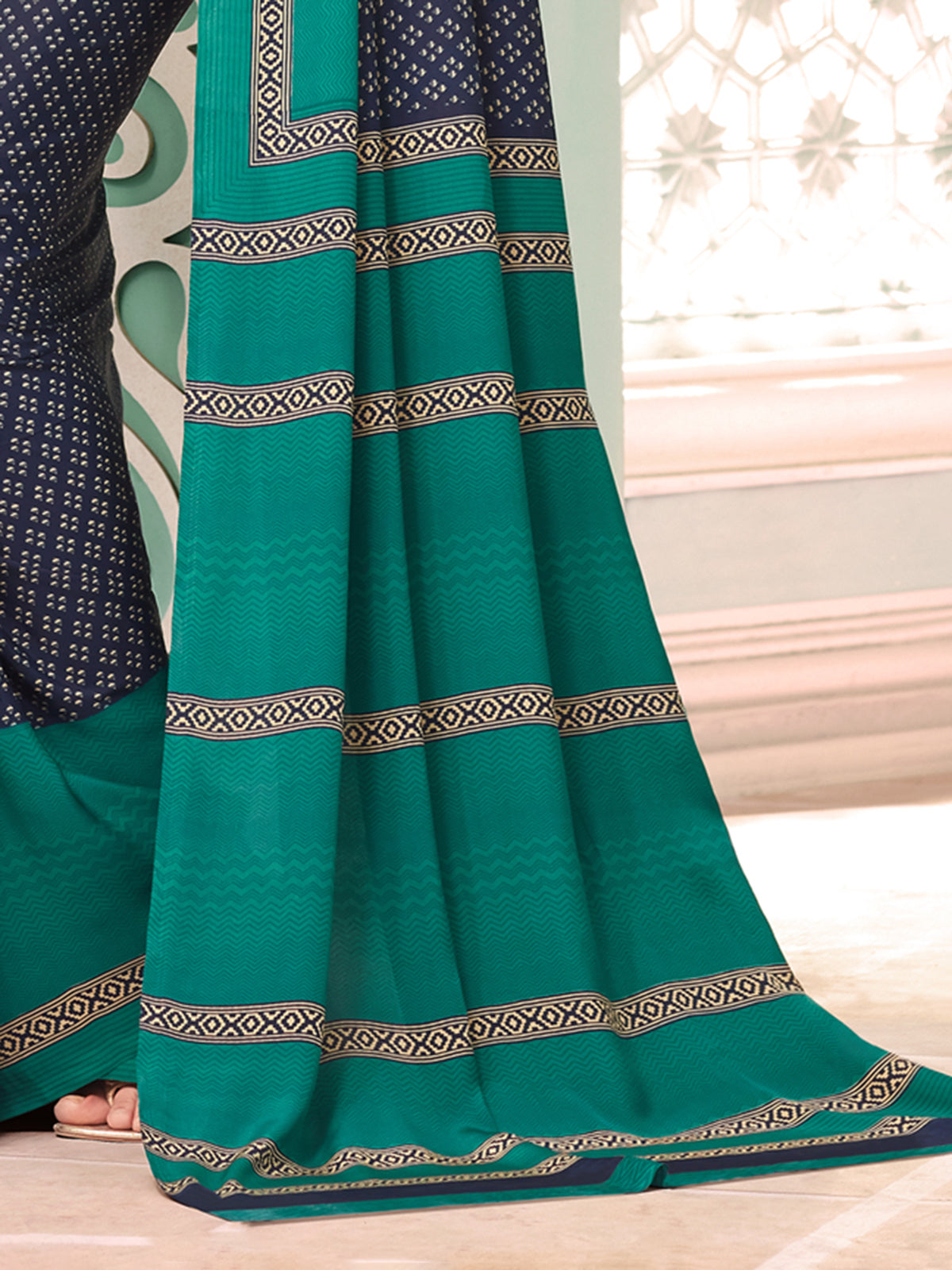 Navy and green crepe silk stylish saree with contrast border