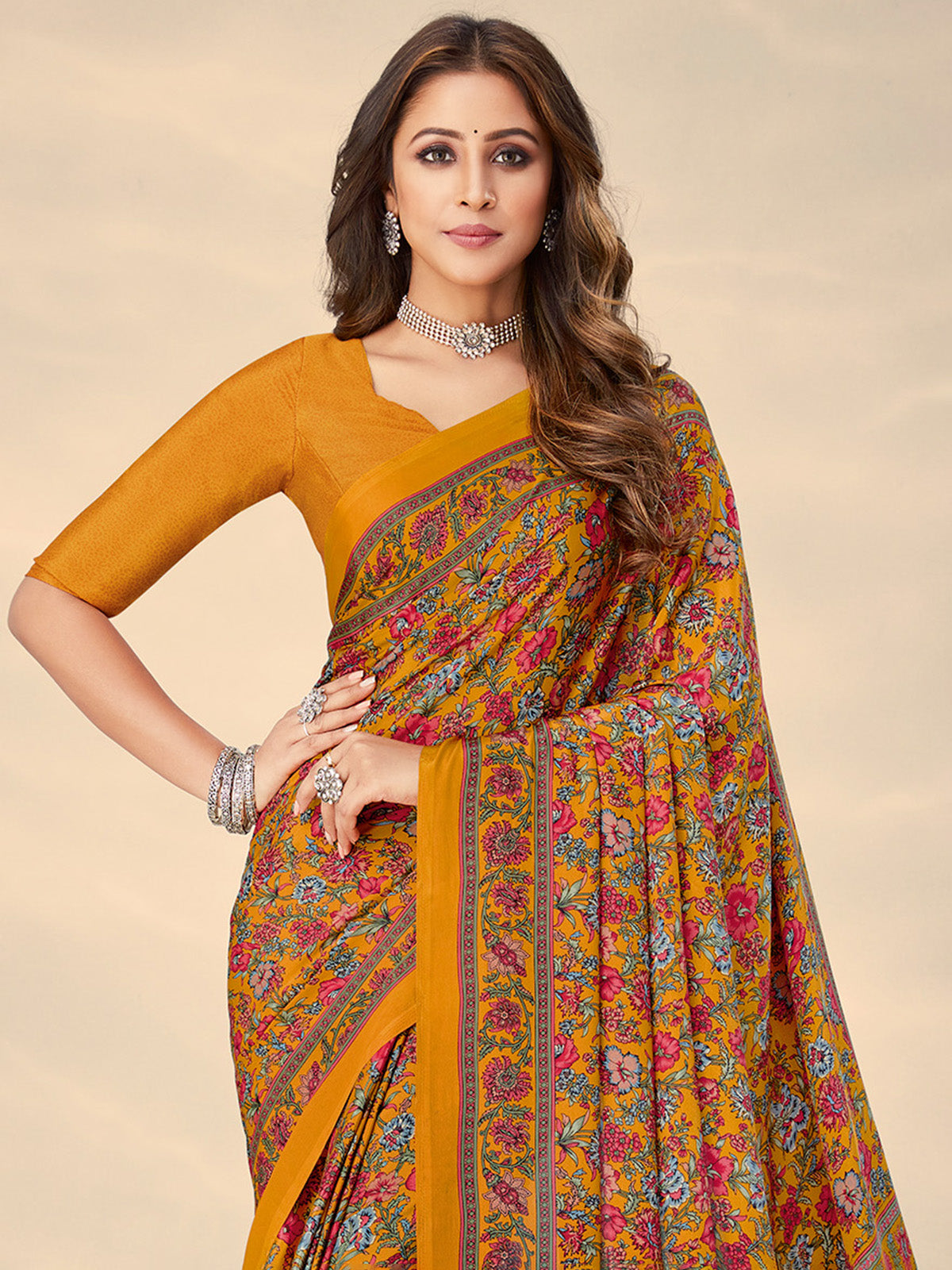 Mustard yellow floral crepe silk elegant saree for everyday wear