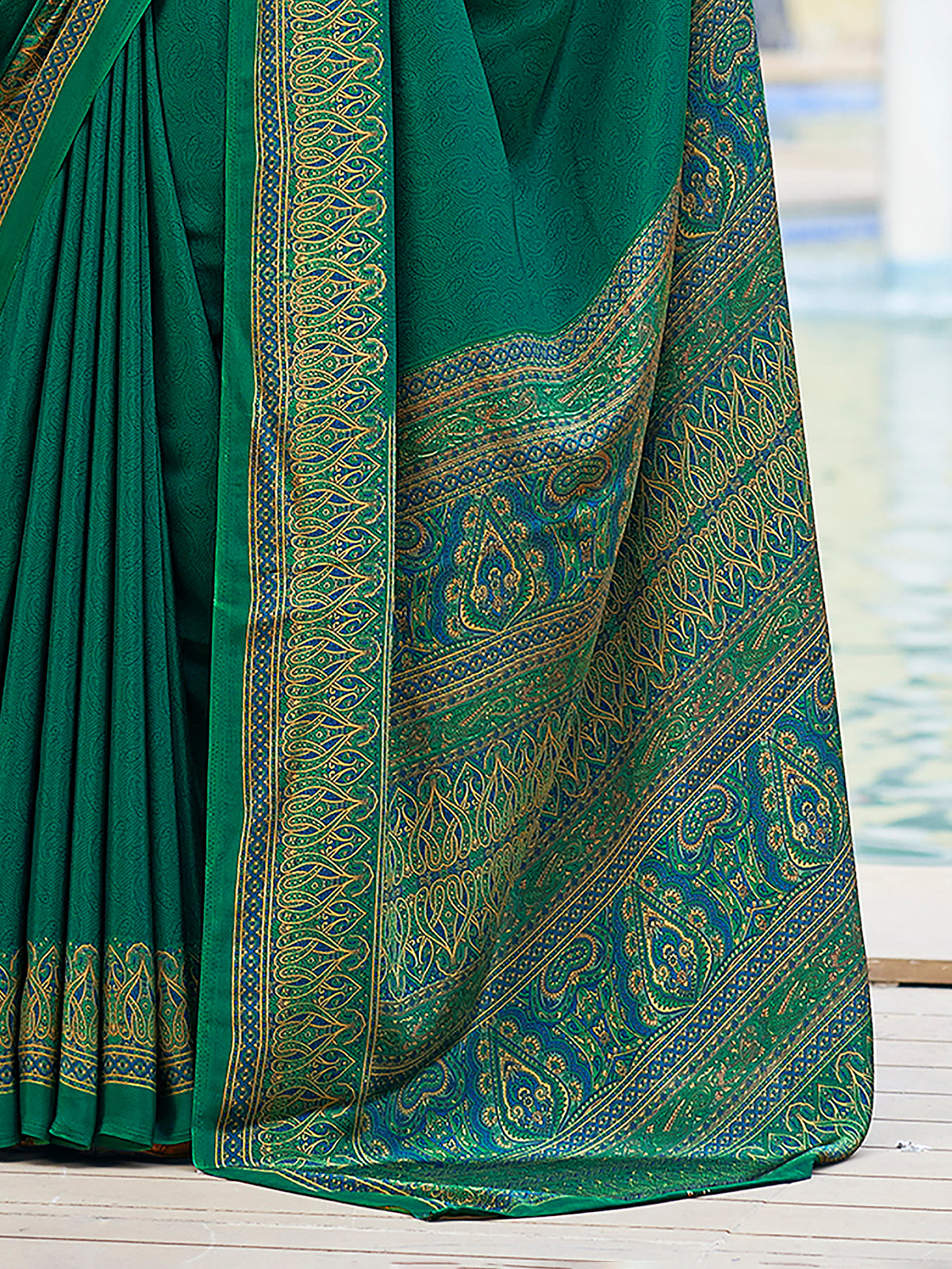 Green printed crepe silk casual saree with contrast border and pallu