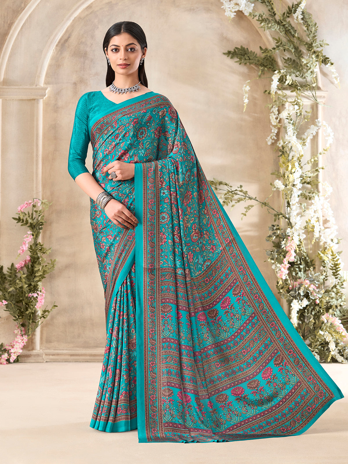 Aqua blue floral printed crepe silk elegant casual wear saree design
