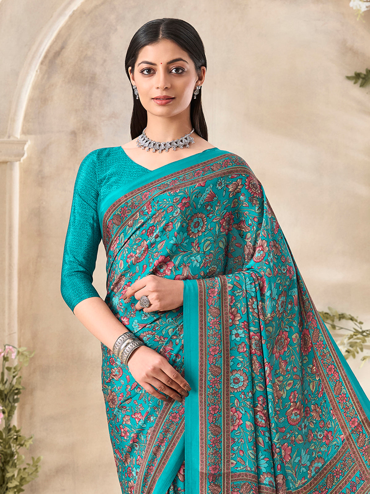 Aqua blue floral printed crepe silk elegant casual wear saree design