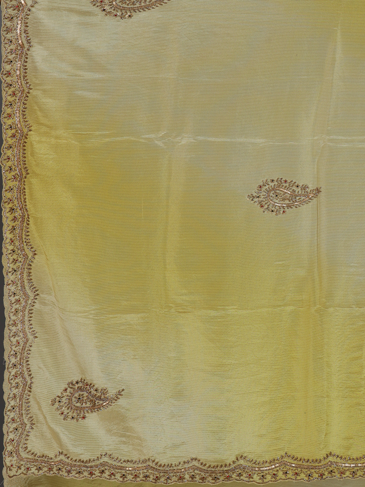 Traditional yellow shaded dola shimmer saree for haldi ceremony