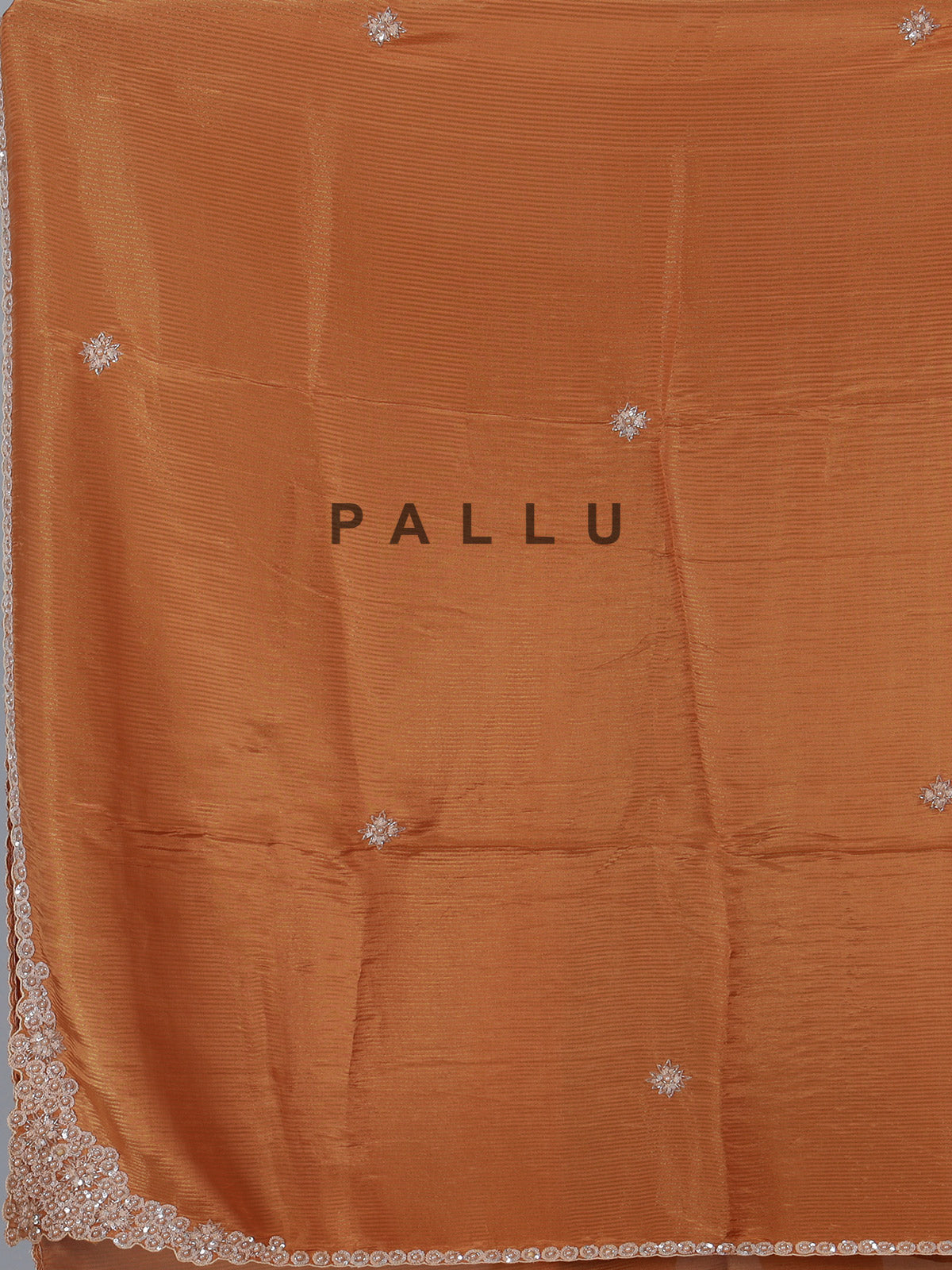 Rust orange shimmer dola silk saree for festive celebrations